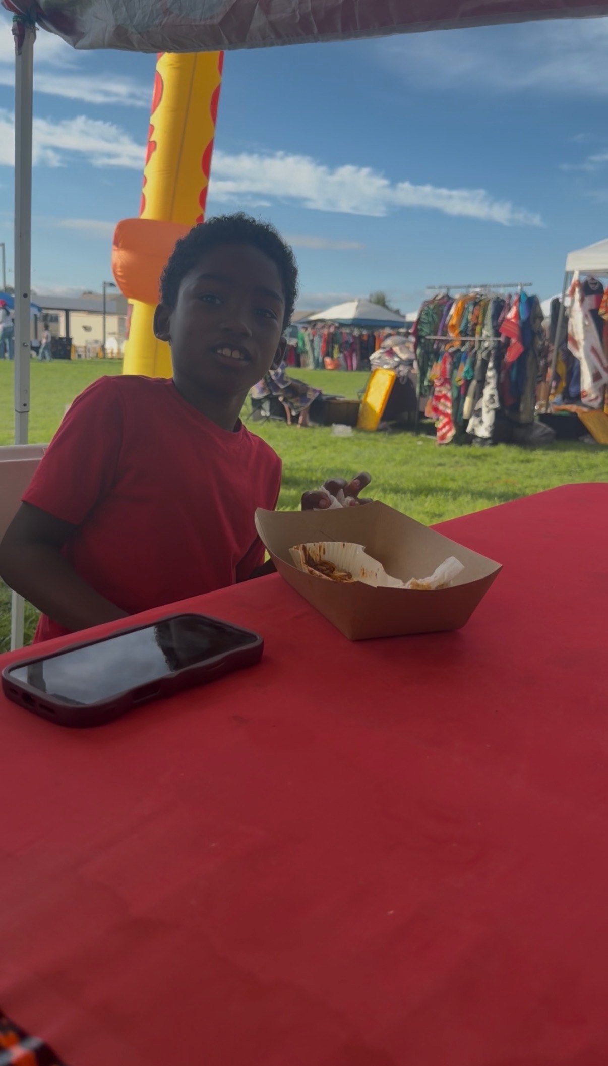 Young Papa Dogs fan enjoying his meal at the event table