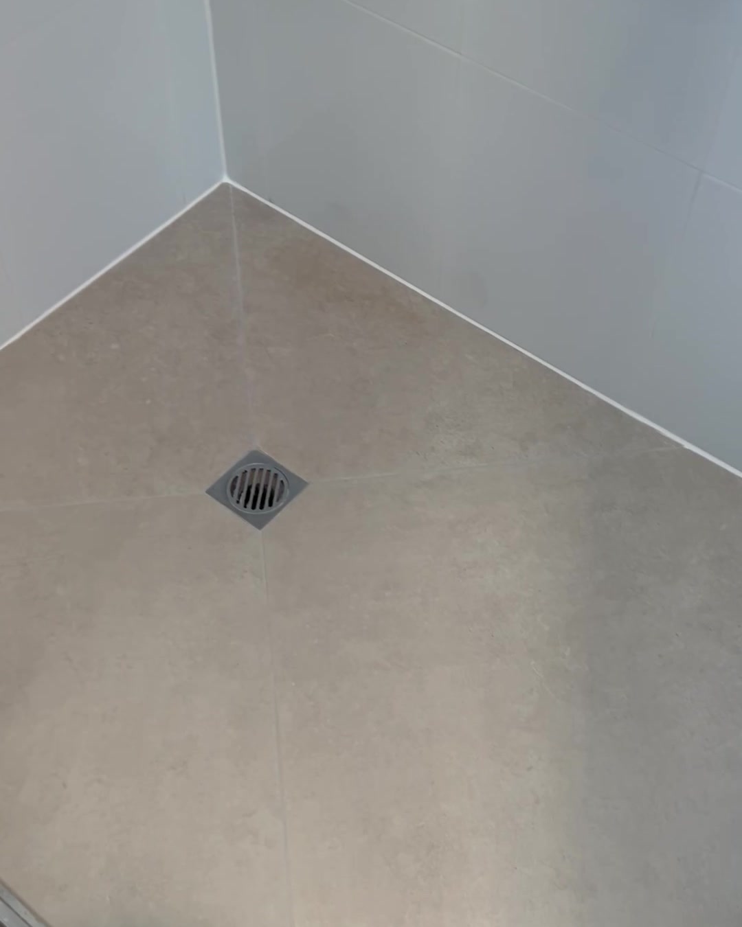 Shower floor and perimeter joins after we finished, fresh grout and sealed perimeter joins