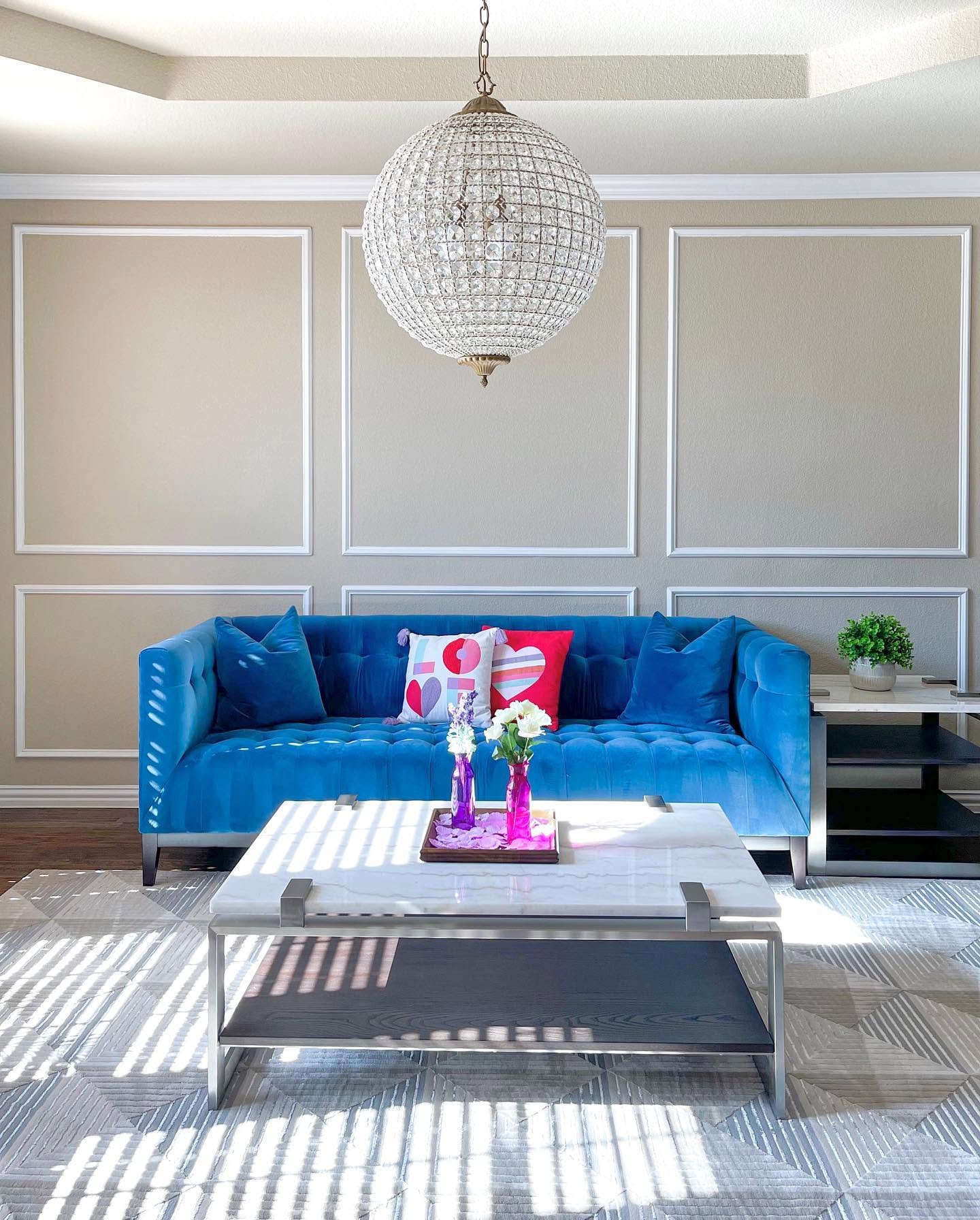 A beautifully cleaned and staged living room with fireplace and hardwood floors
