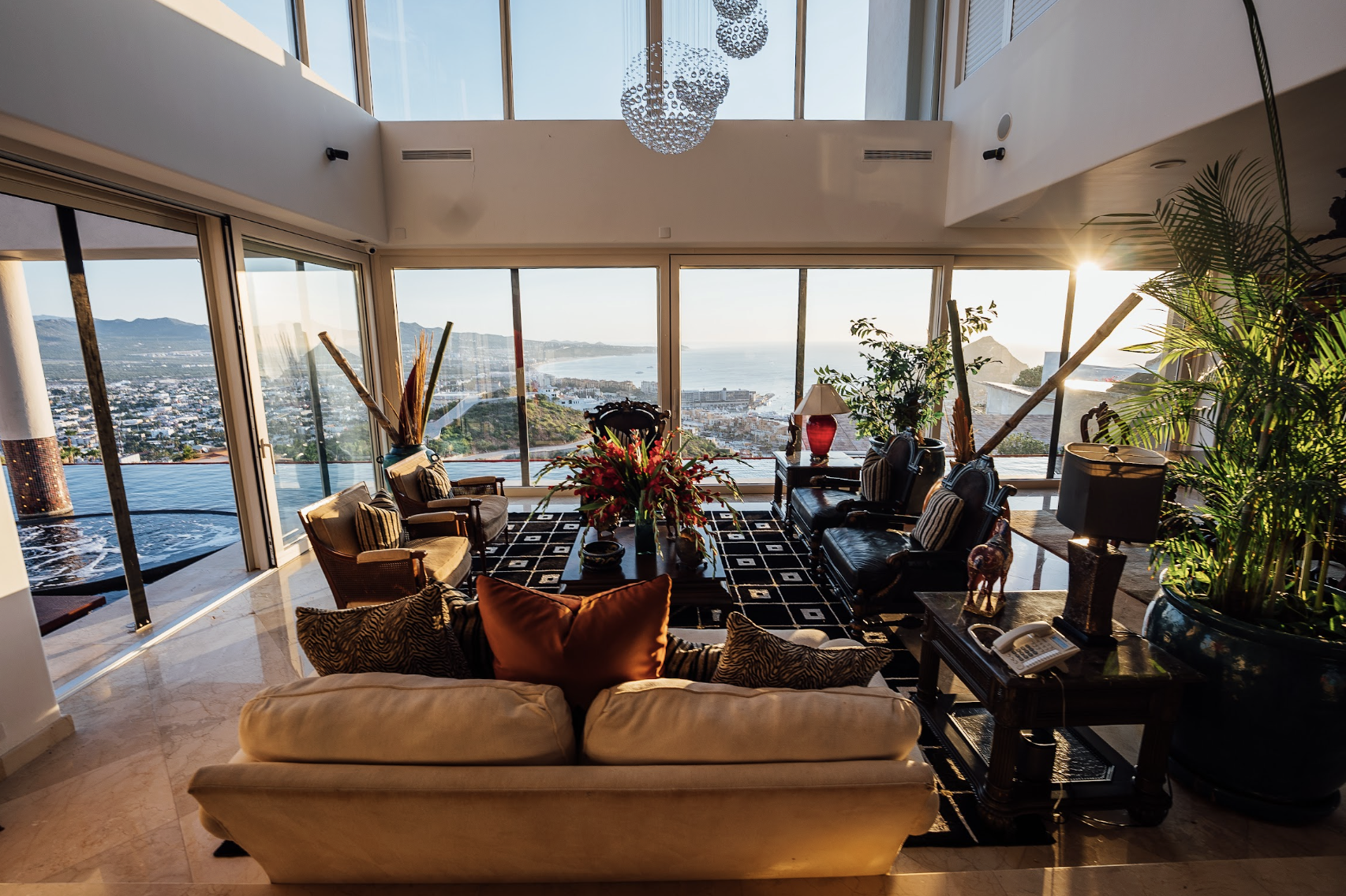 Soaring Double-Height Grand Salon with Panoramic Ocean & Horizon Glass Walls