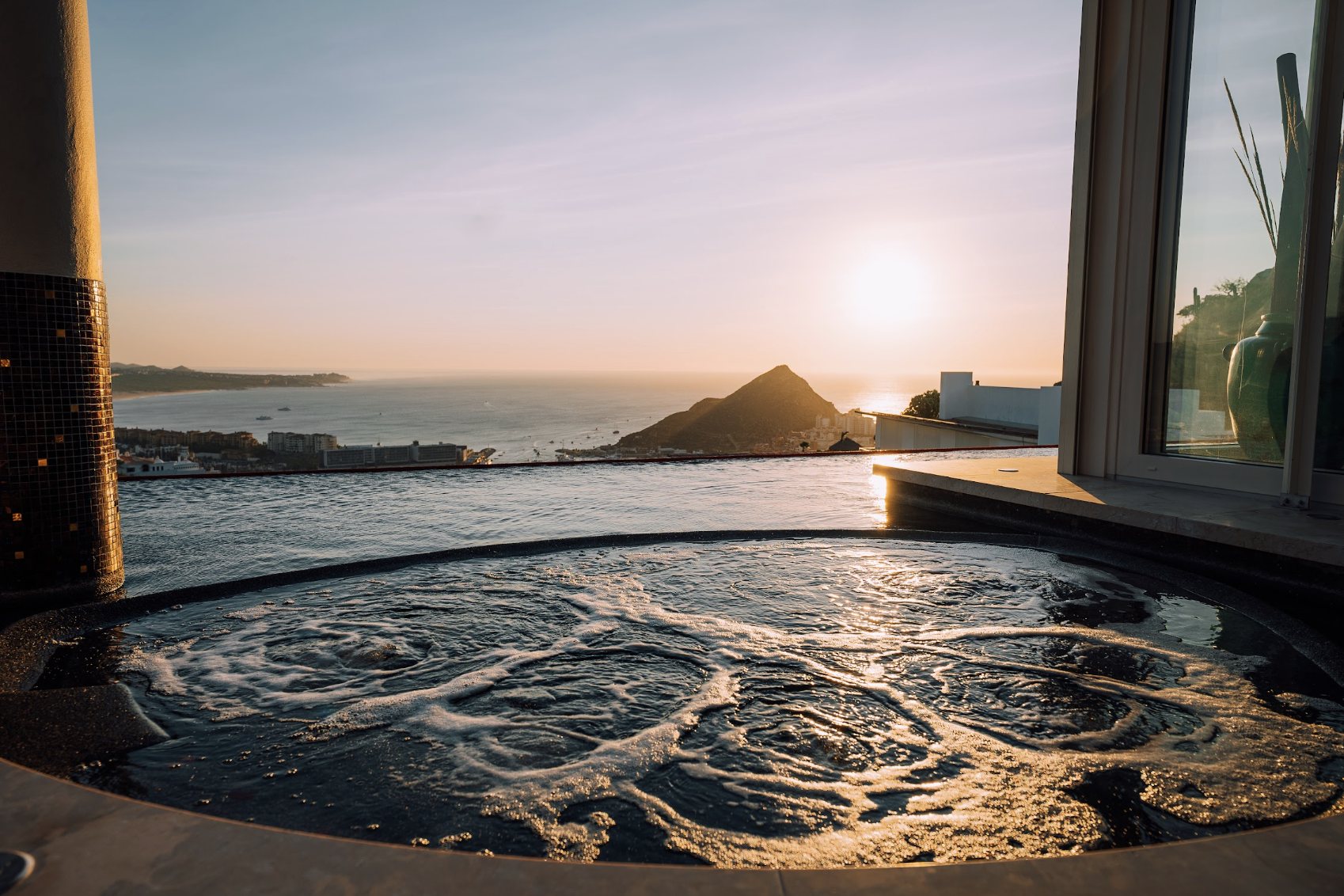 Heated Horizon Jacuzzi overlooking the ocean and sunset