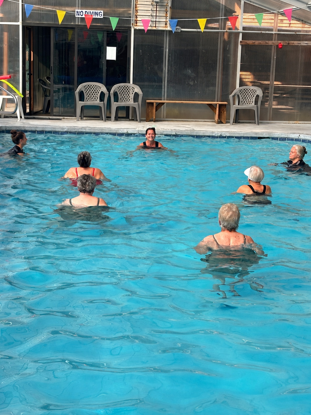 Water Aerobics class in the indoor pool at Olympia Athletic Club
