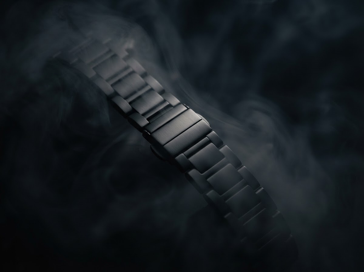 A matte black band in dramatic shadow by EXACT