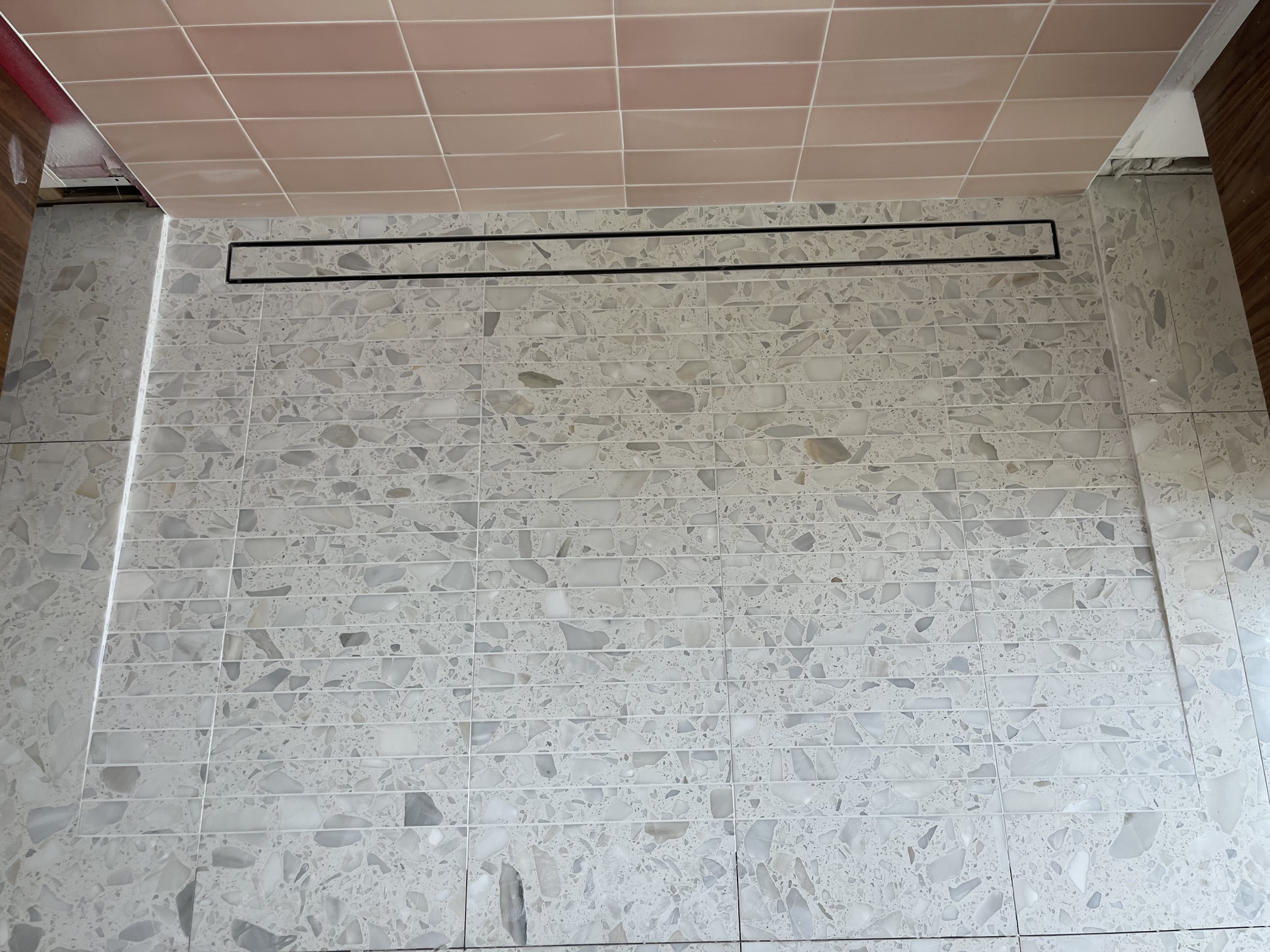 Terrazzo Mosaic Shower Floor & Linear Drain project by Davenport Tile
