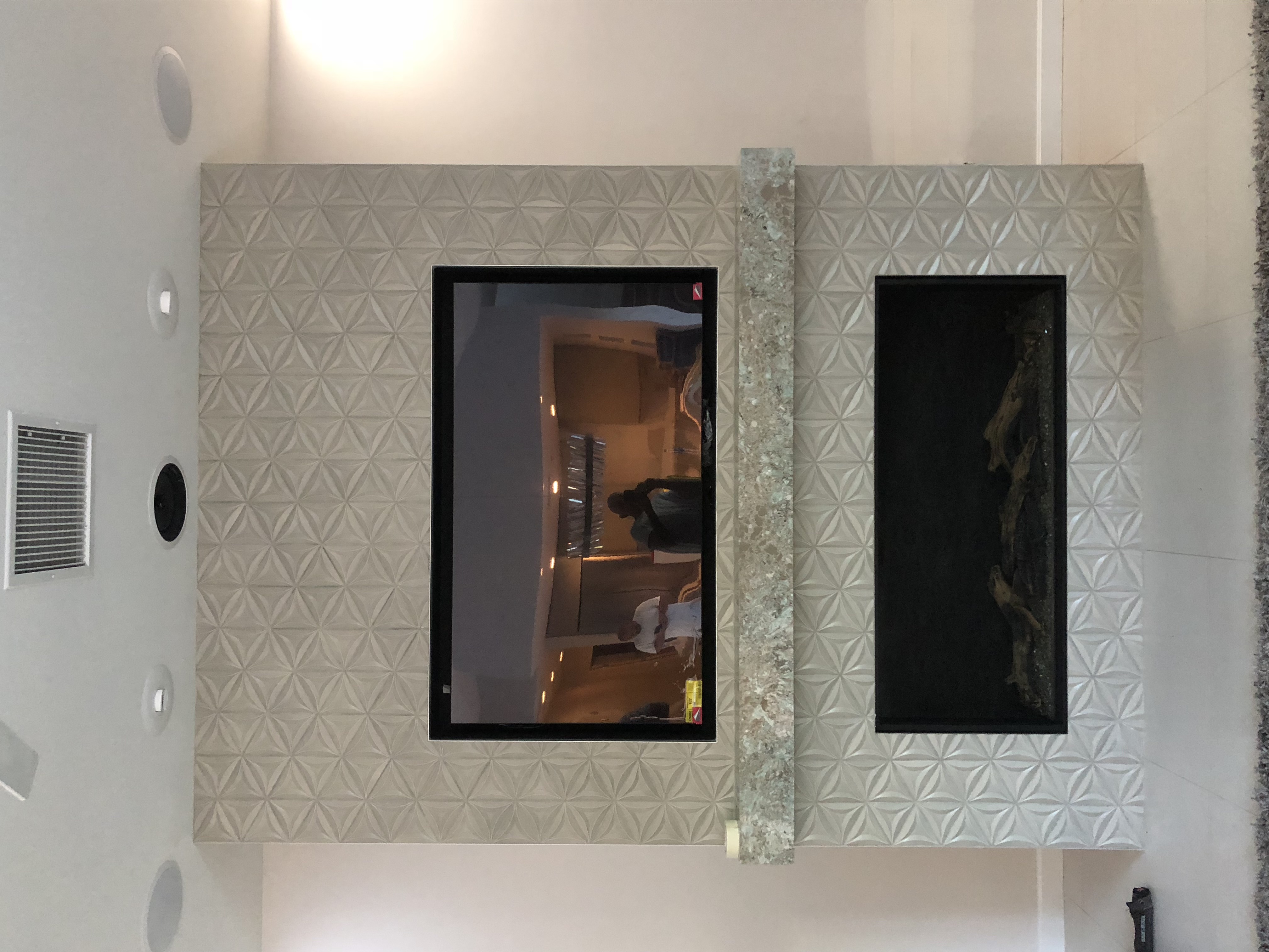 Geometric Fireplace Surround completed by Davenport Tile