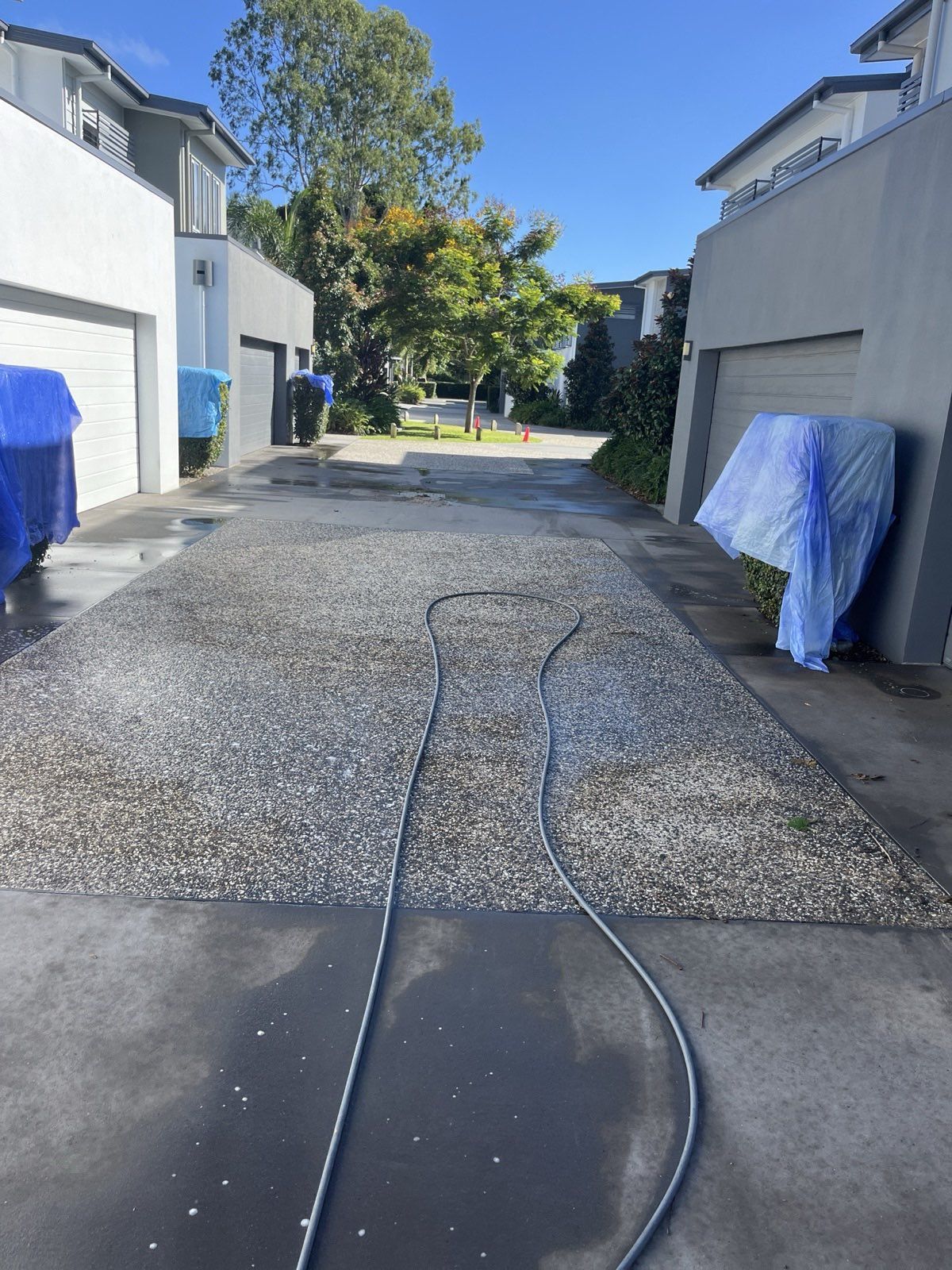 Hope Island common driveway before cleaning