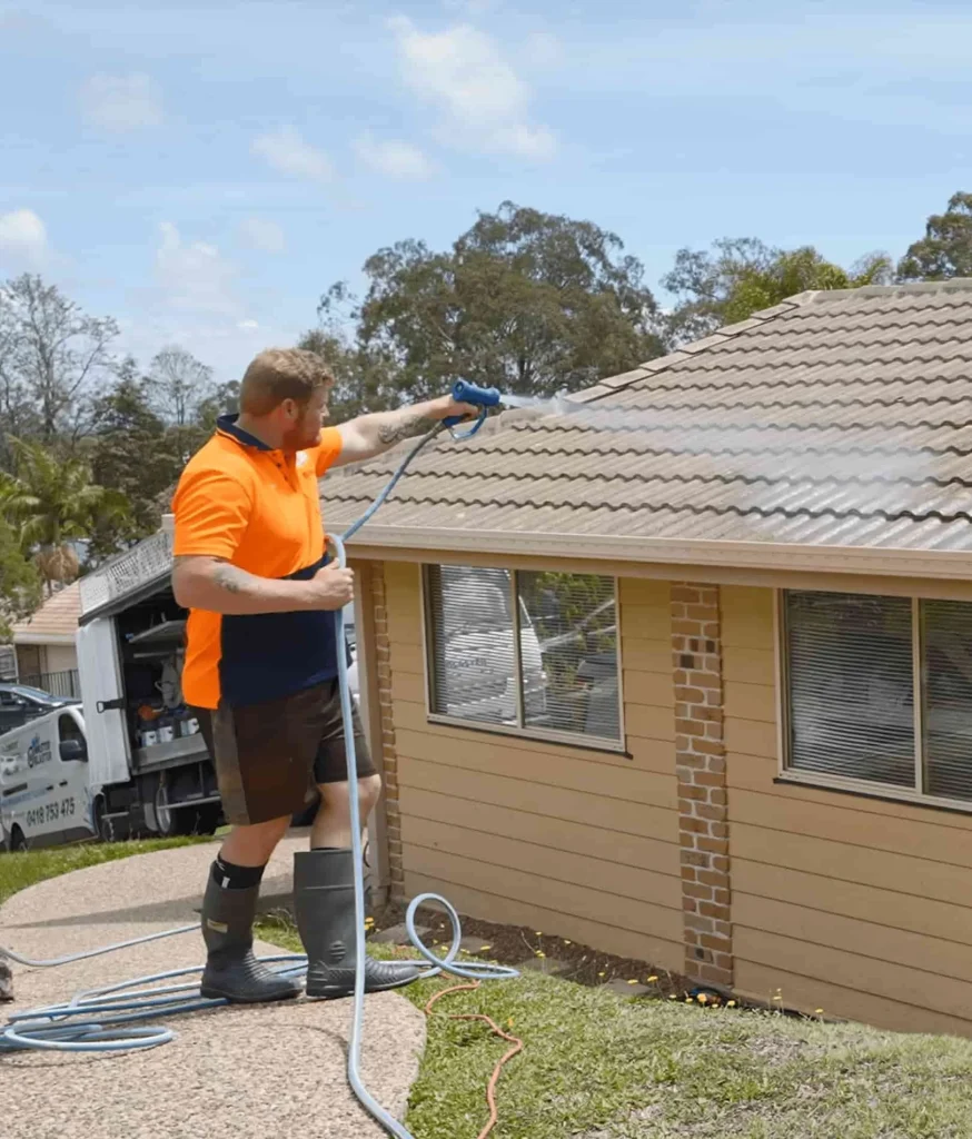 Roof soft wash treatment on Gold Coast residence