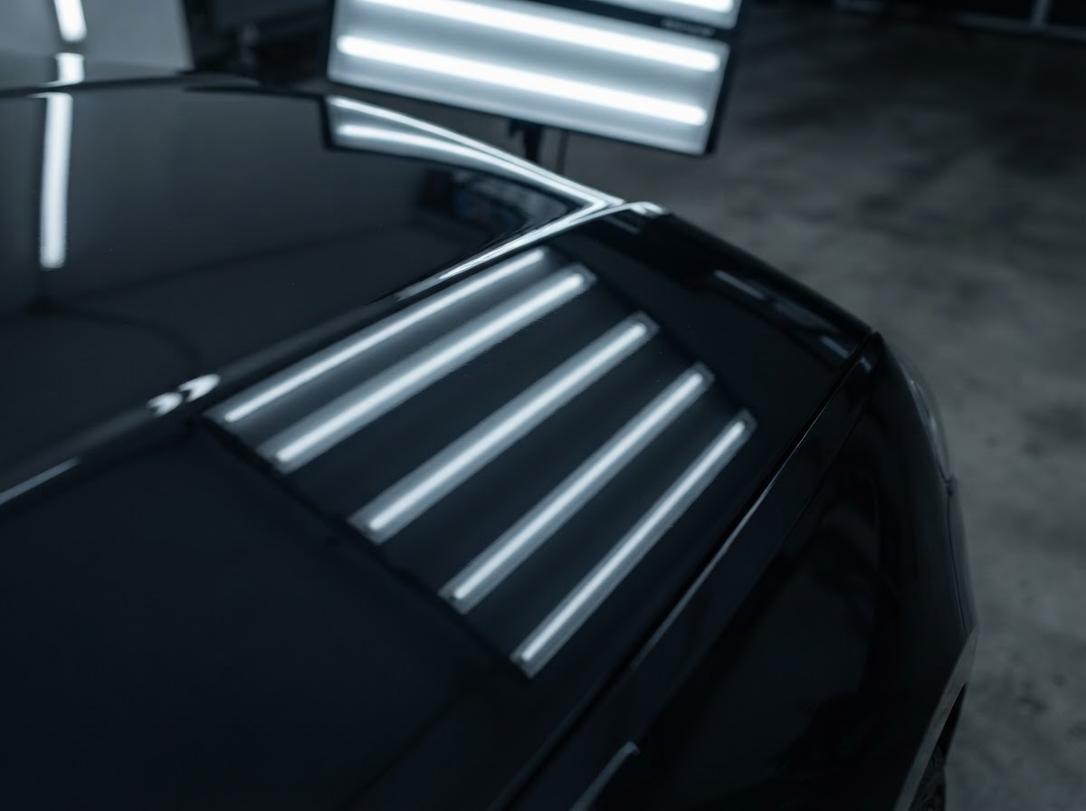 Flawless corrected clear coat gloss inspected under LED lighting at Empire Auto Detailing in St. George, Southern Utah