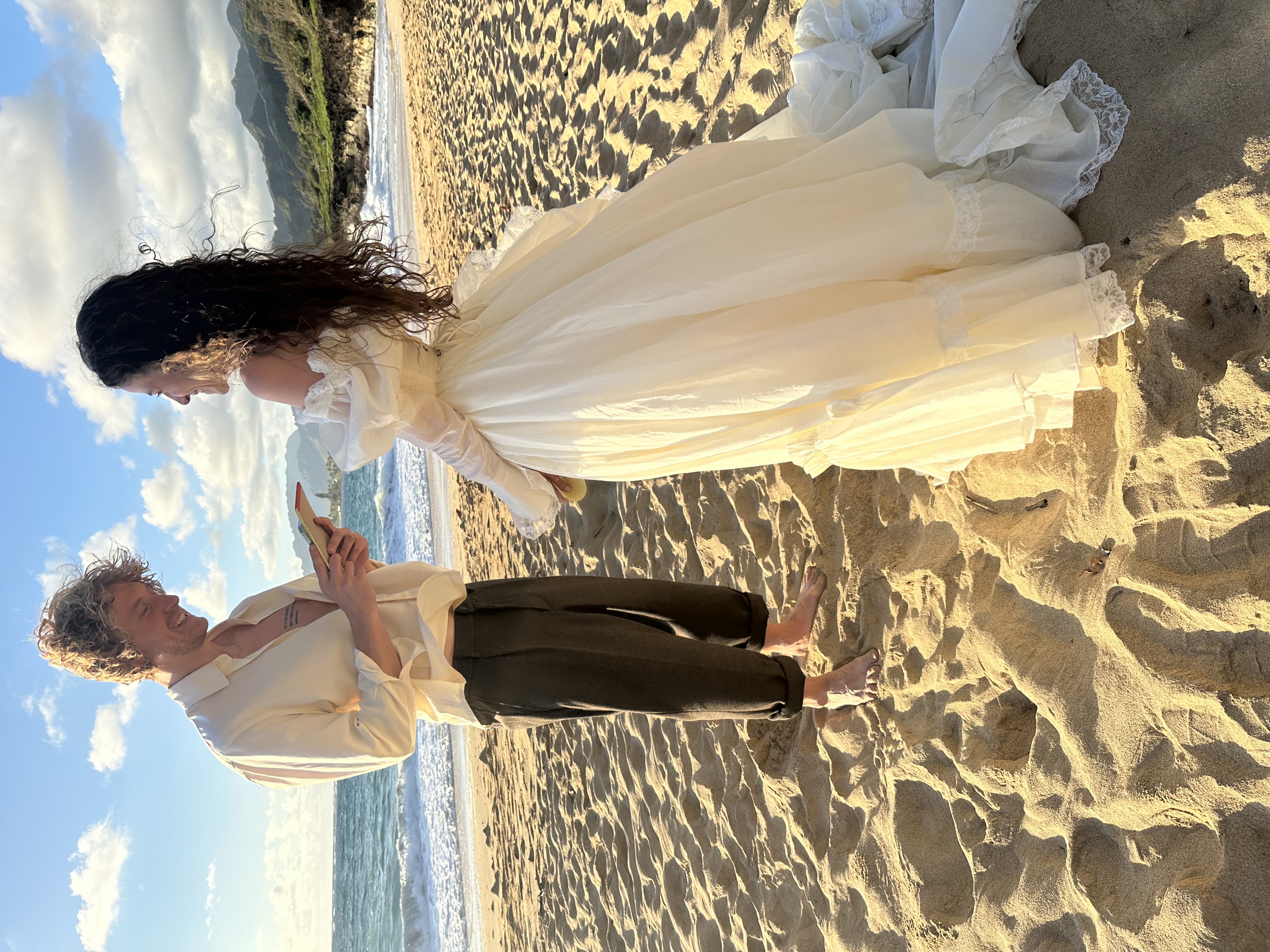 A happy couple celebrating their Hawaiian wedding