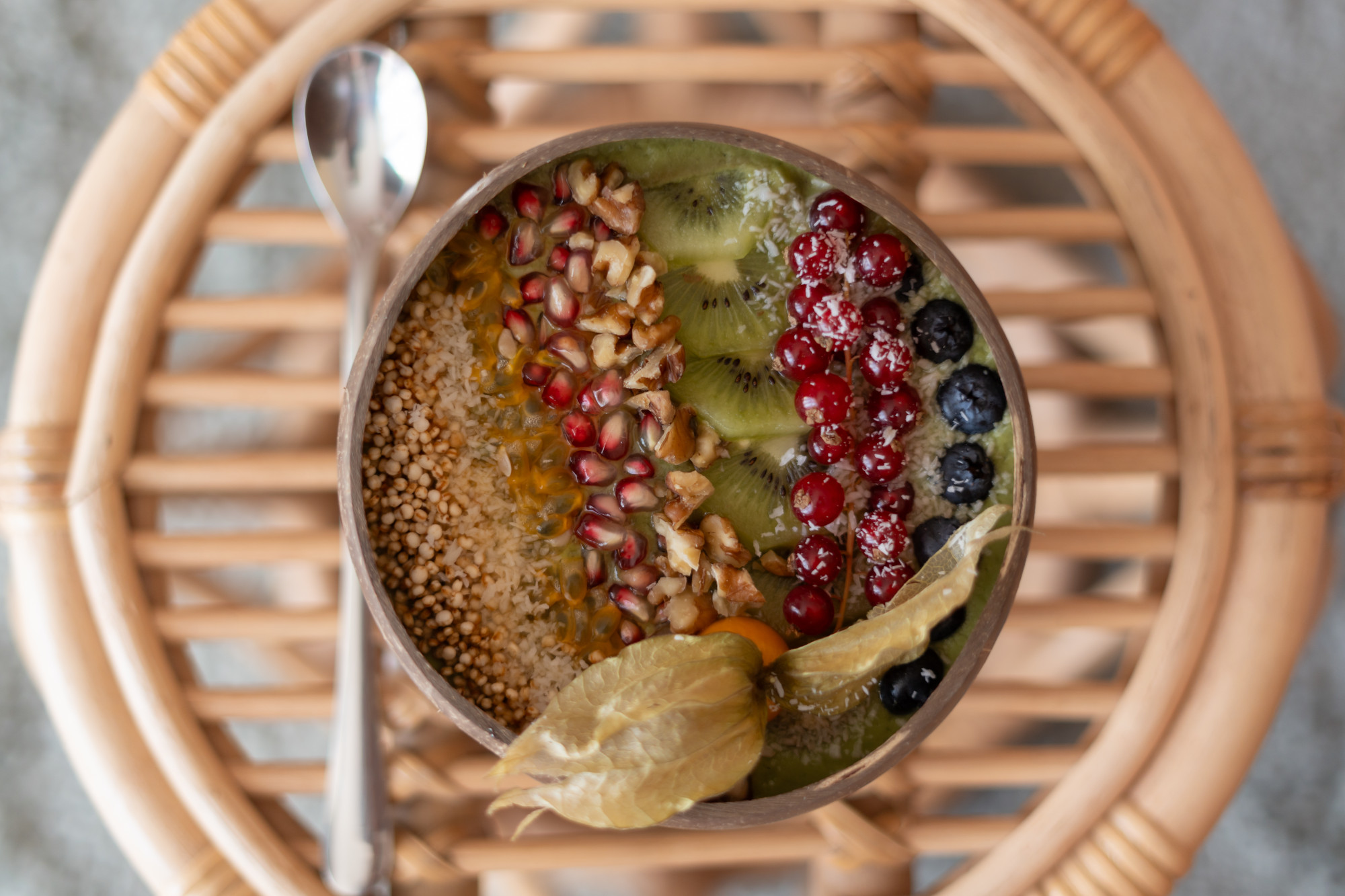 Freshly prepared nutrient-rich fruit and seed smoothie bowl