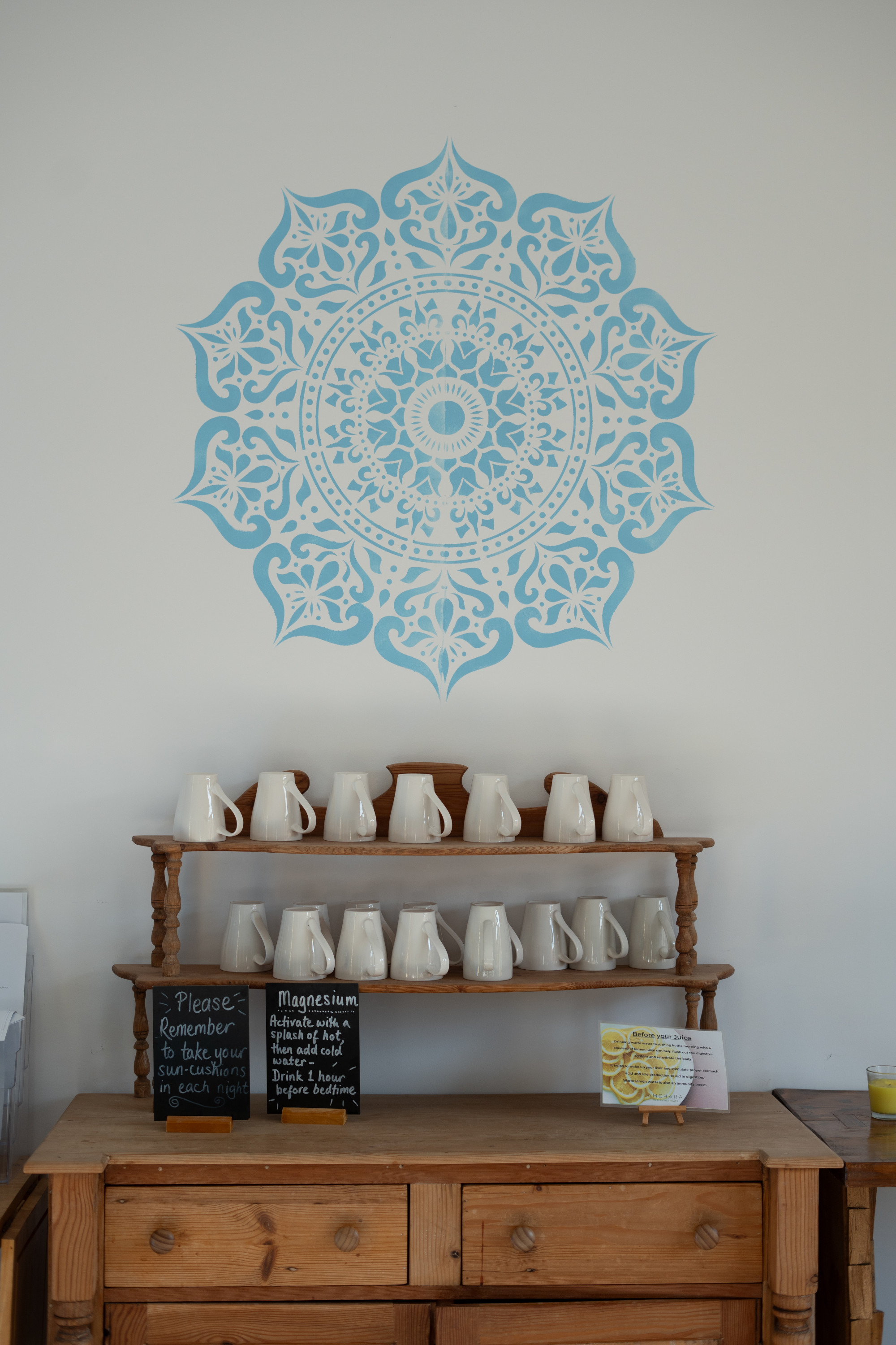 Herbal tea, magnesium hydration station and mandala wall art