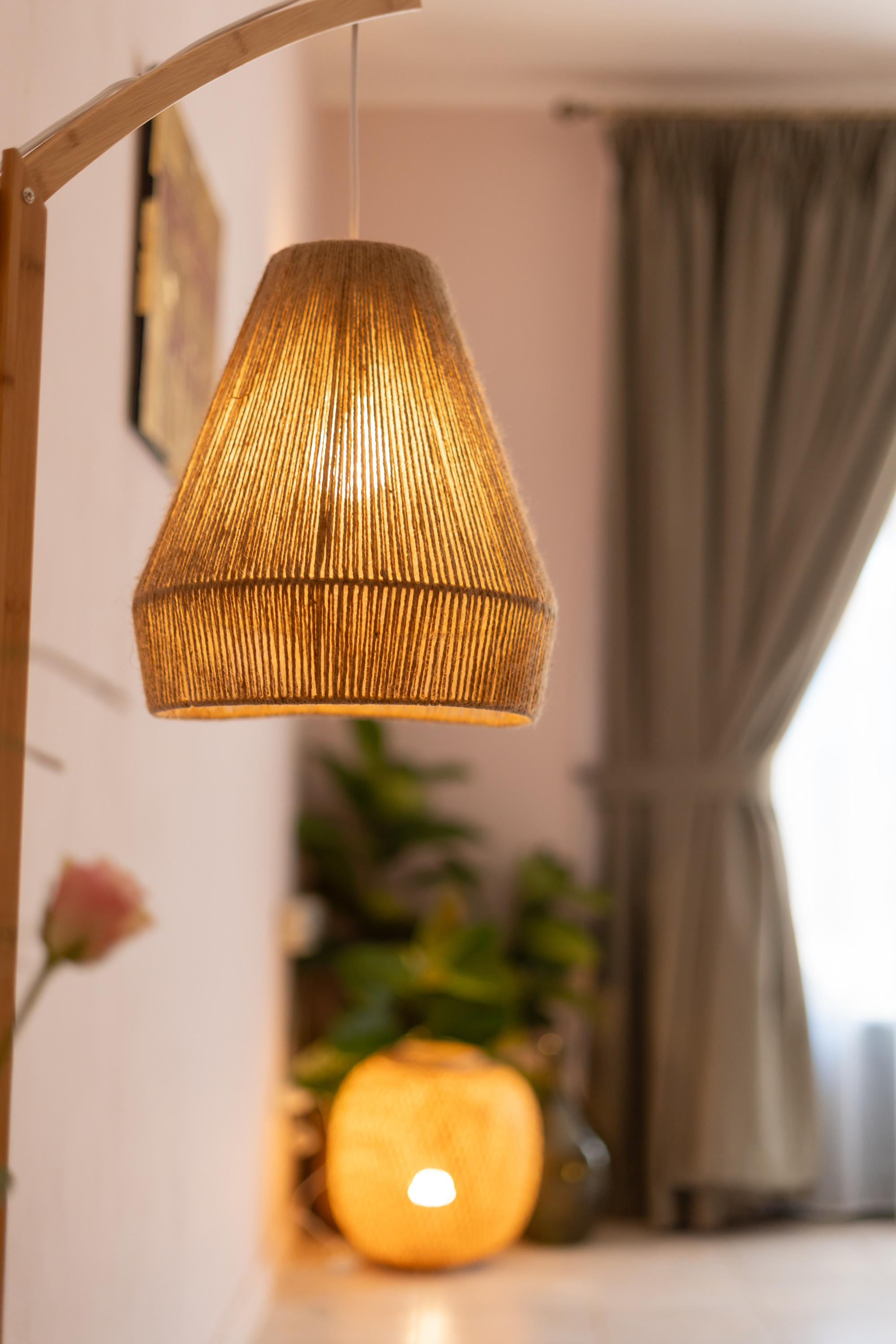 Warm ambient woven lighting in guest apartment lounge