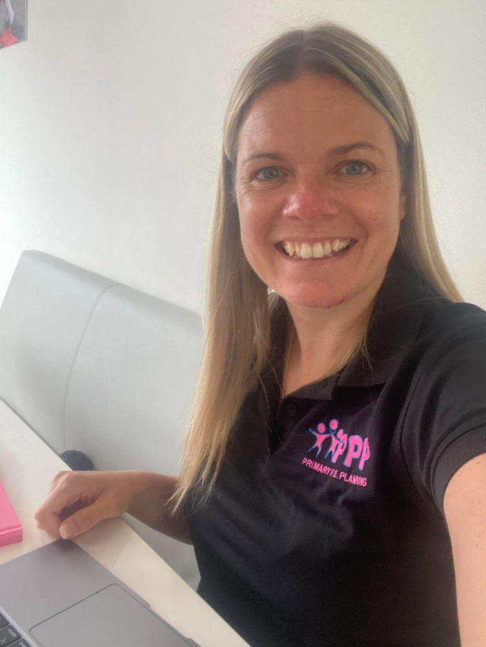 Primary PE Planning founder wearing PPP team shirt