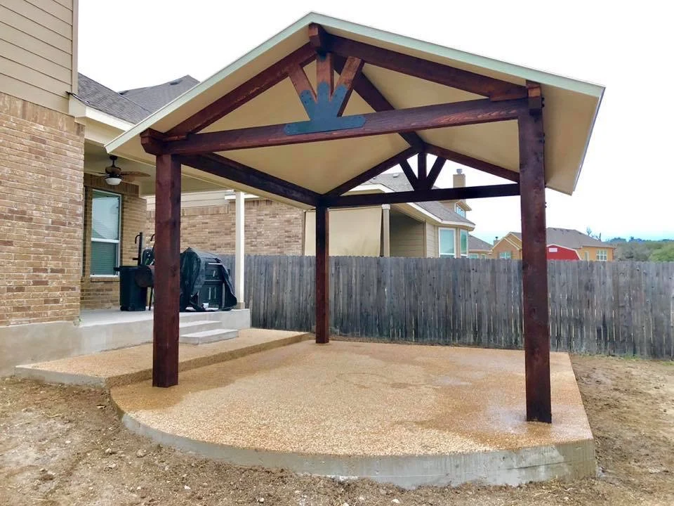 Freestanding cedar gable roof patio pavilion in San Antonio backyard