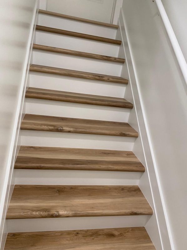 Custom Hardwood Staircase & White Riser Trim