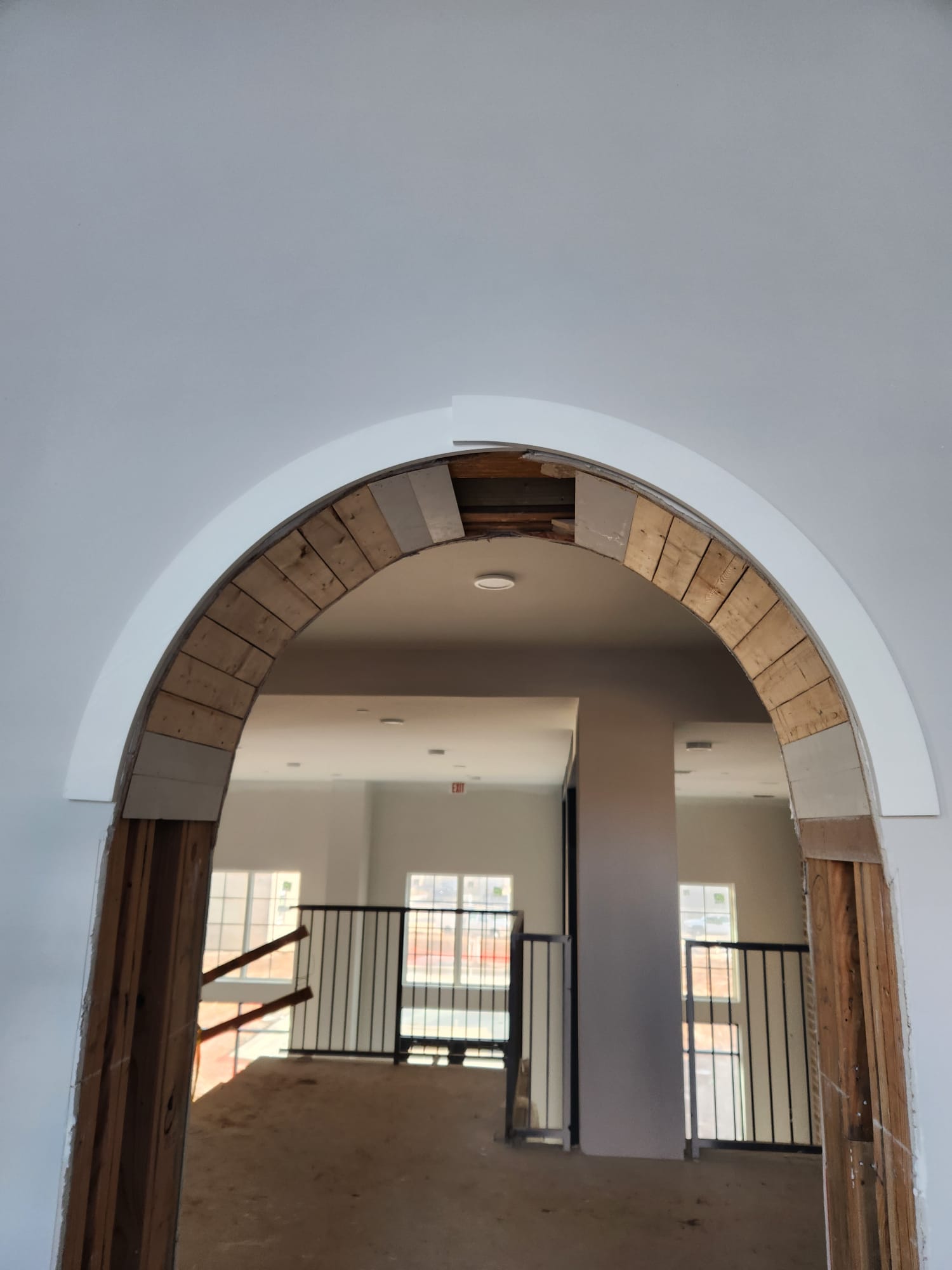 Custom architectural radius barrel arch framing with precision segmented wood blocking in Clemmons NC