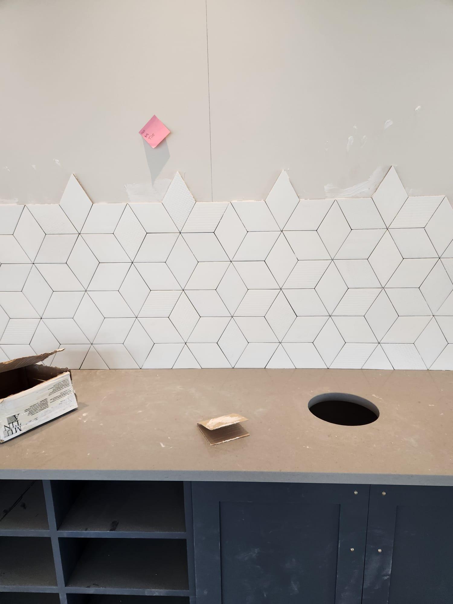 Geometric diamond wall pattern and custom painted commercial vanity base cabinet in Winston-Salem NC