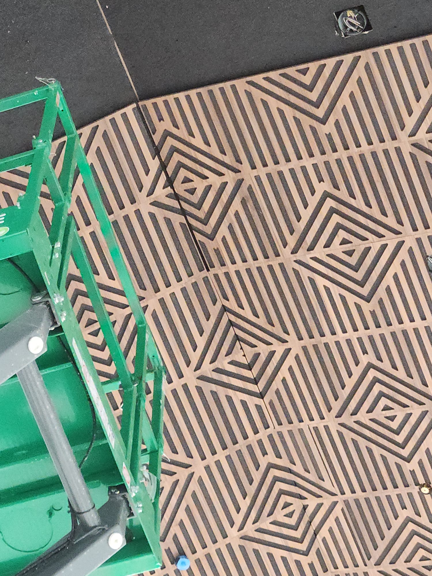 Geometric concentric diamond wood acoustic ceiling panel pattern installed in Winston-Salem NC