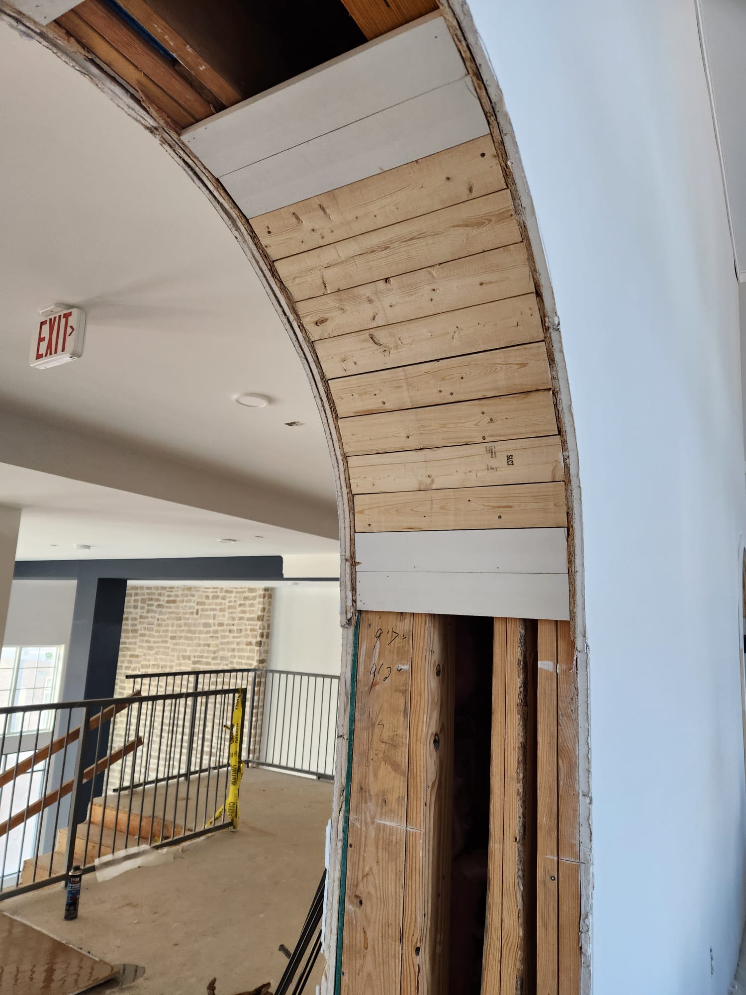 Master carpenter radius barrel arch framing and precision timber segmented blocking in Lewisville NC