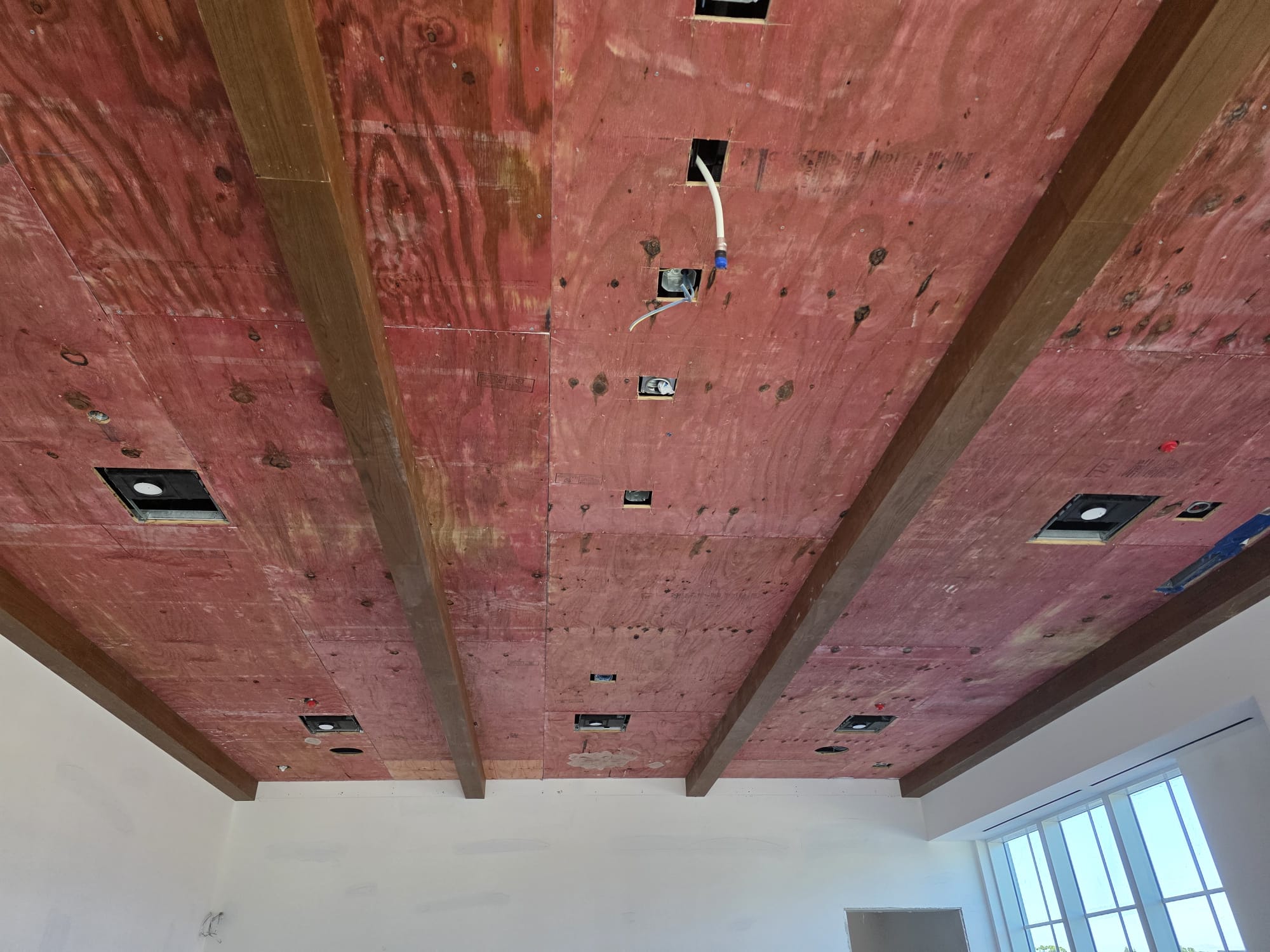 Architectural ceiling timber beams rough-in framing with pre-wired electrical cutouts in Winston-Salem NC