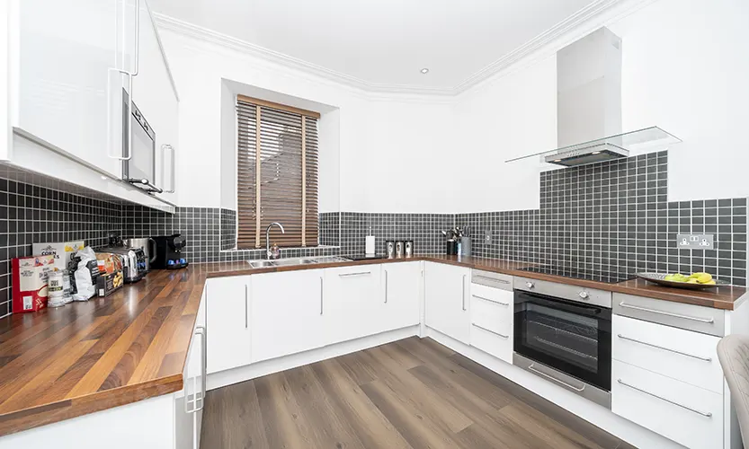 Fully equipped modern kitchen with integrated appliances