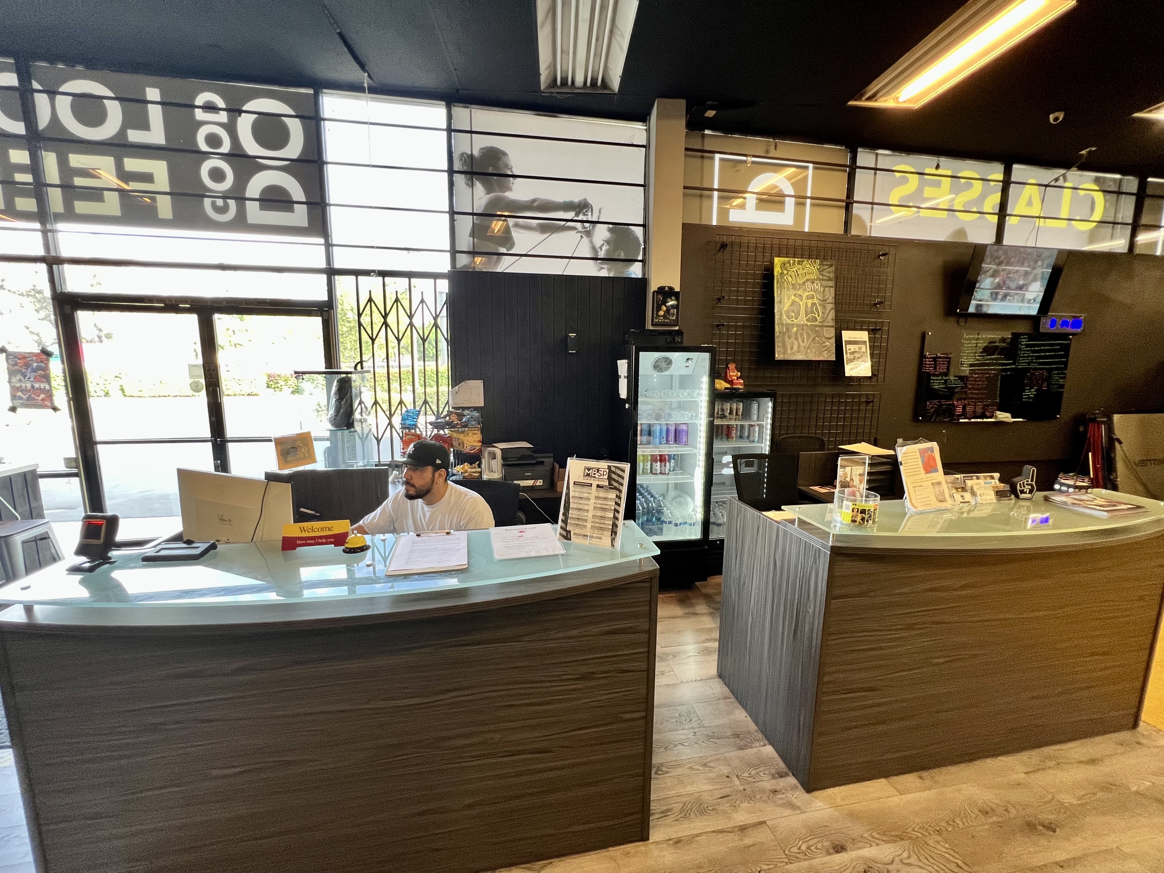 MBSP front desk check-in area with beverage fridge