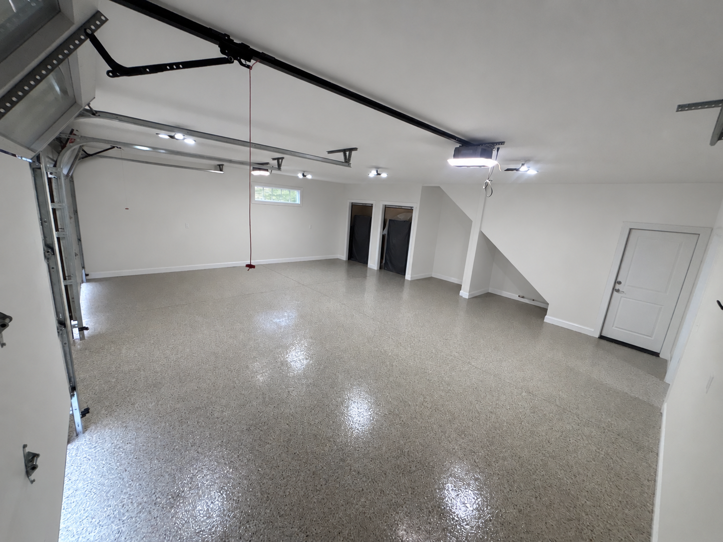 After: Finished ONYX full-broadcast flake garage floor
