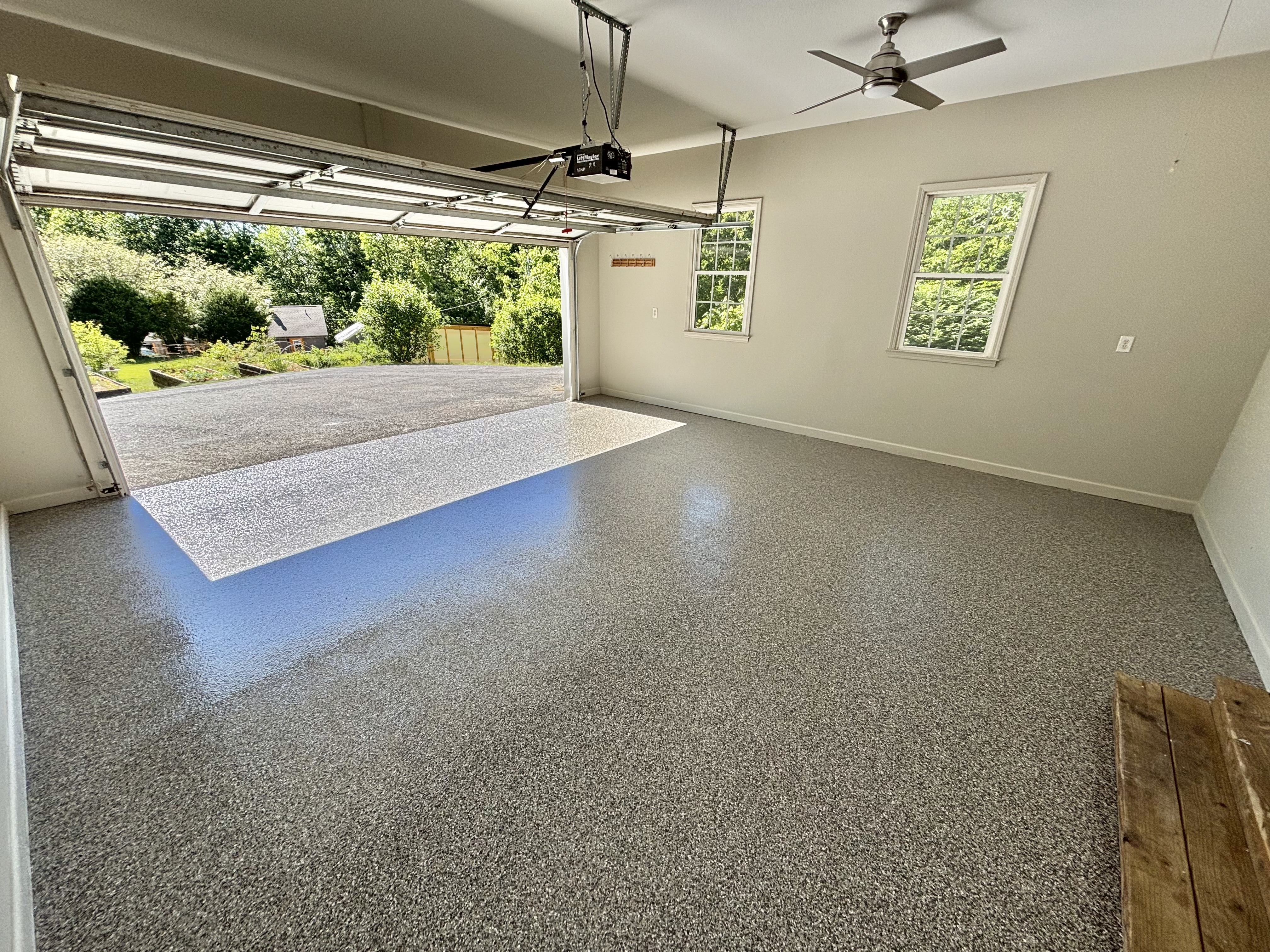 Finished full-broadcast flake garage floor installation
