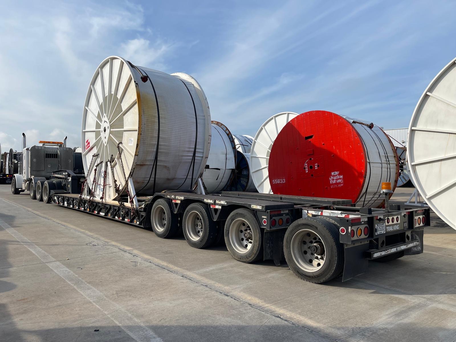 Industrial coiled tubing spools on multi-axle heavy haul trailer