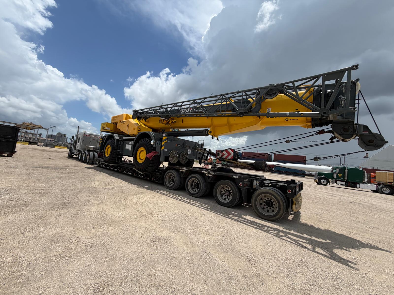 Grove all-terrain mobile crane mobilization transport on multi-axle trailer