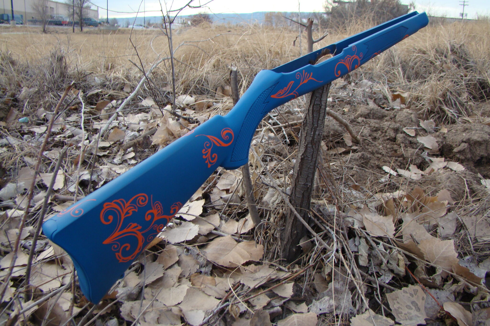 Sky blue and hunter orange Cerakote