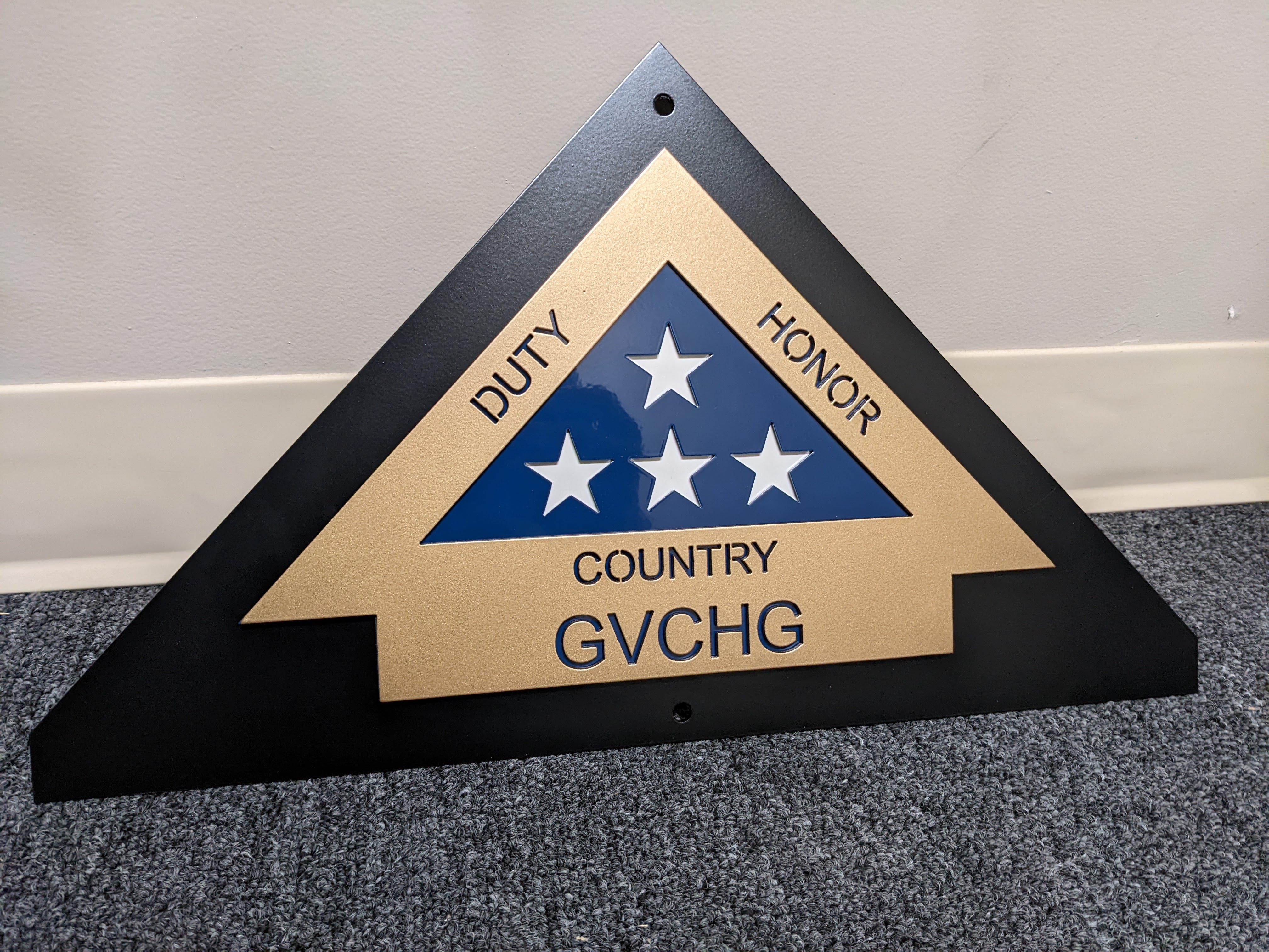 Custom powder coated Honor Guard memorial tribute plaque with gold, blue, and white star finish
