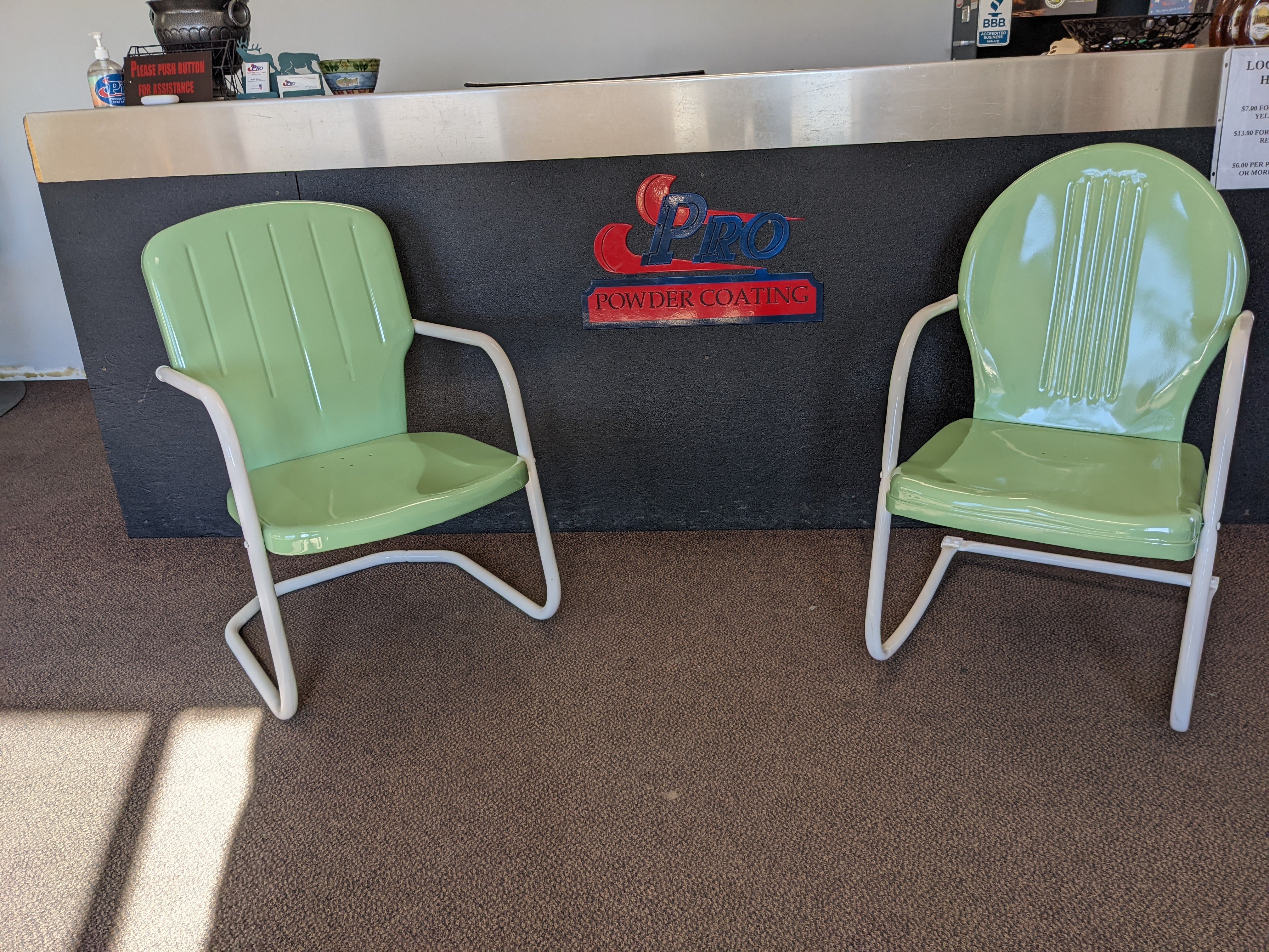 Restored vintage metal lawn chairs powder coated in gloss mint green and crisp white