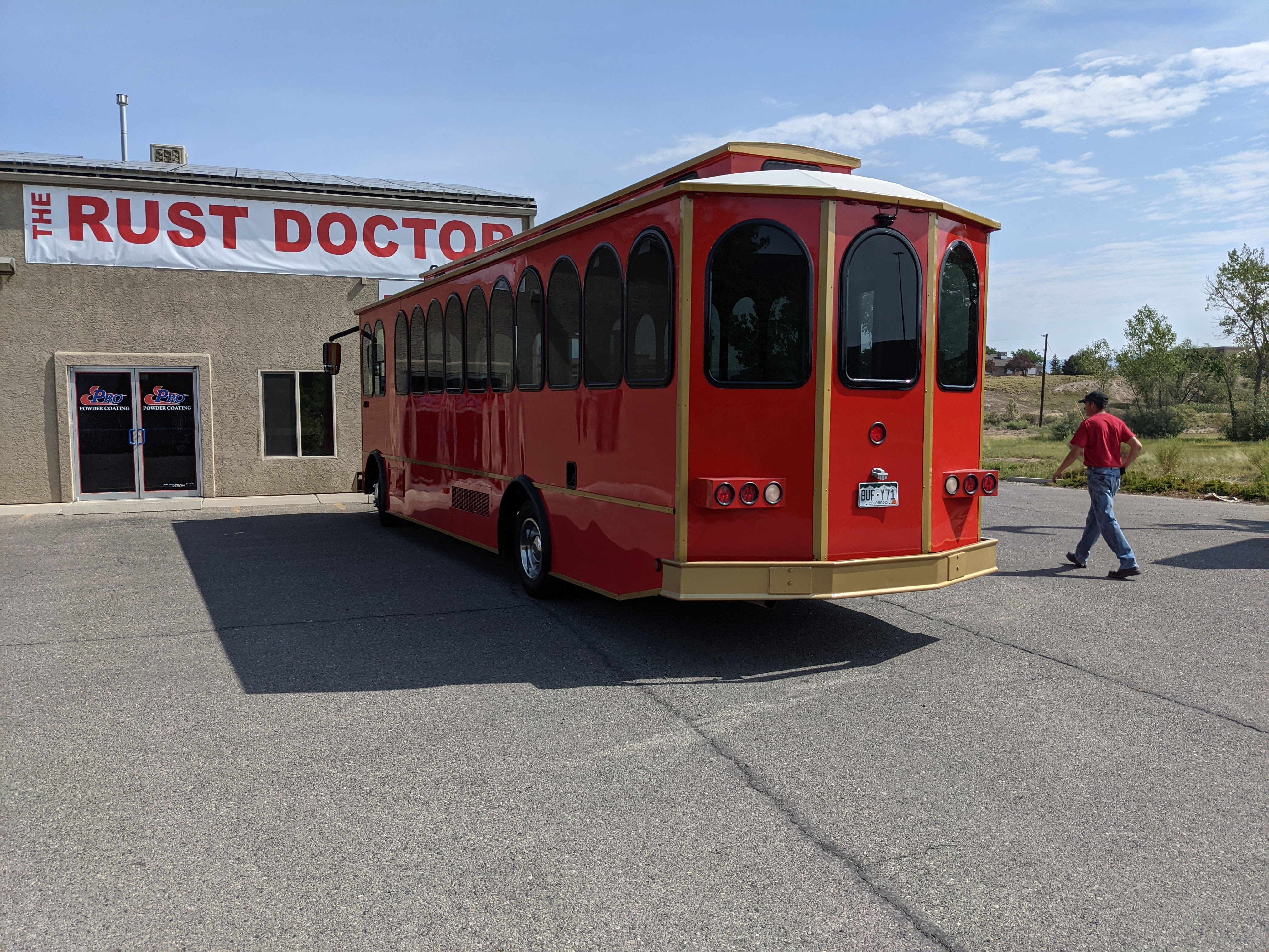 Custom red and gold powder coated trolley bus restoration