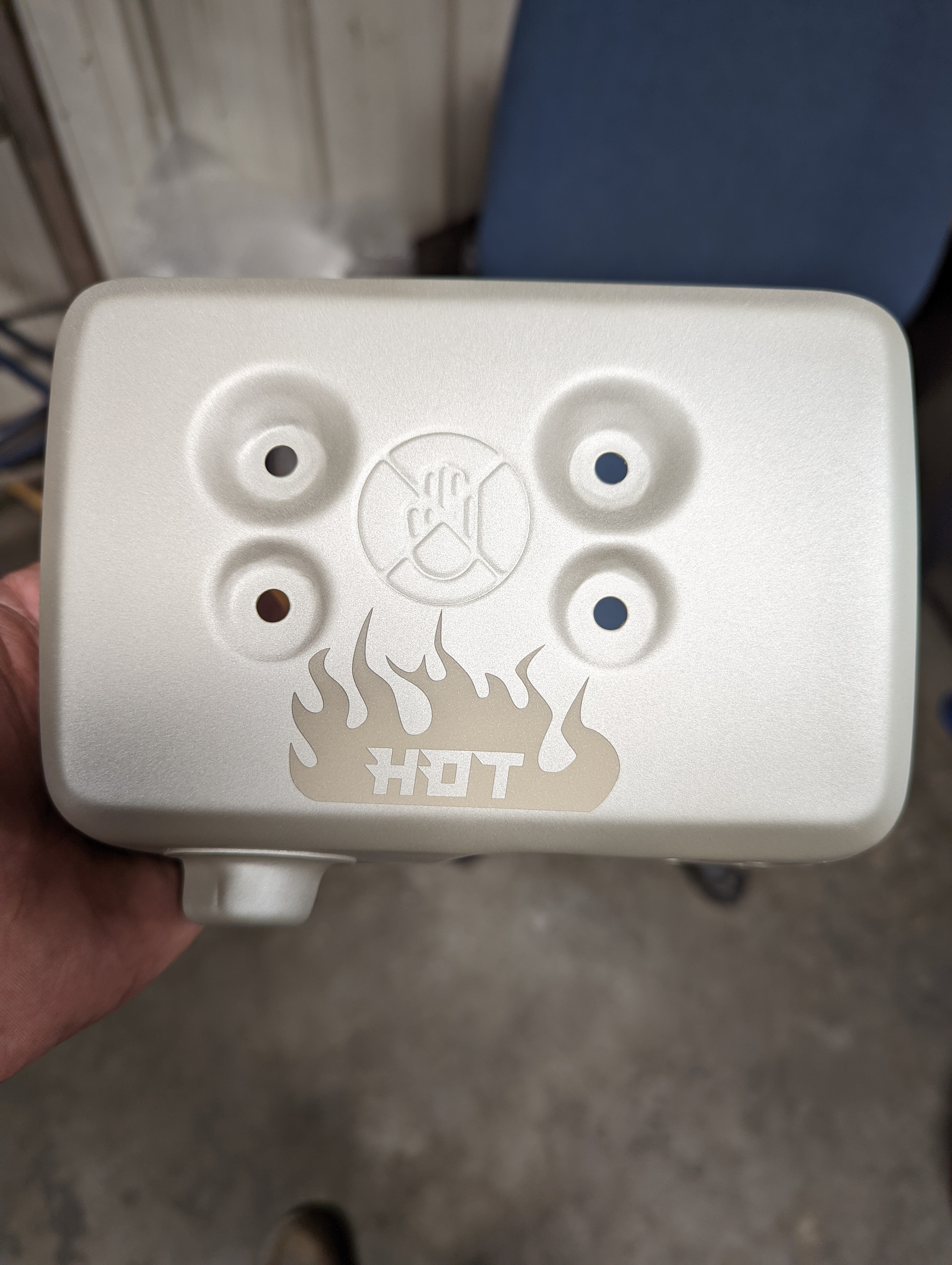 Custom Cerakote heat shield with hot flame and hand icon stencil detailing