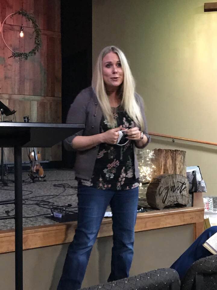 Dr. Laura Fleetwood speaking intimately to audience