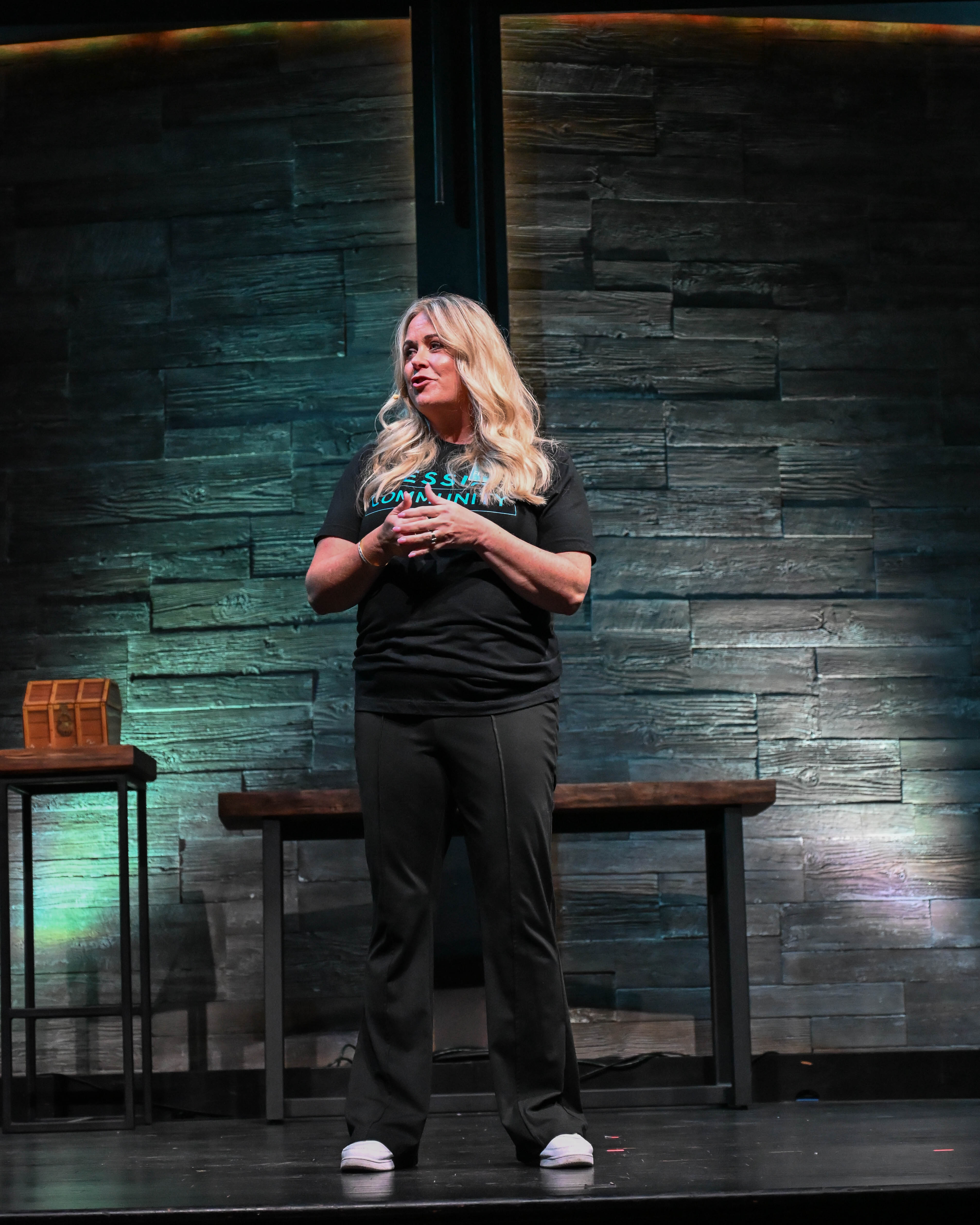 Dr. Laura Fleetwood speaking onstage