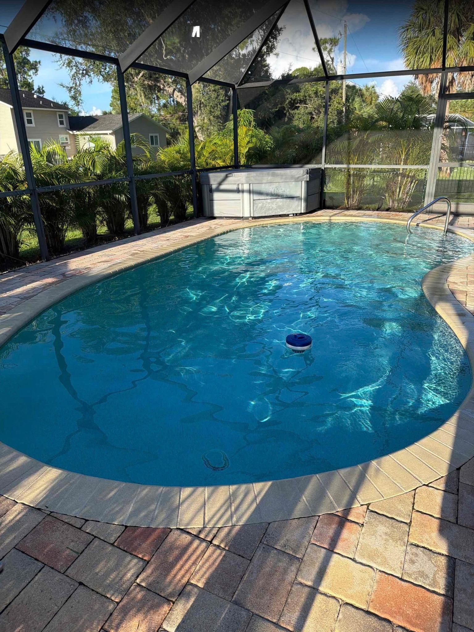Pool cleaning service in North Port backyard pool