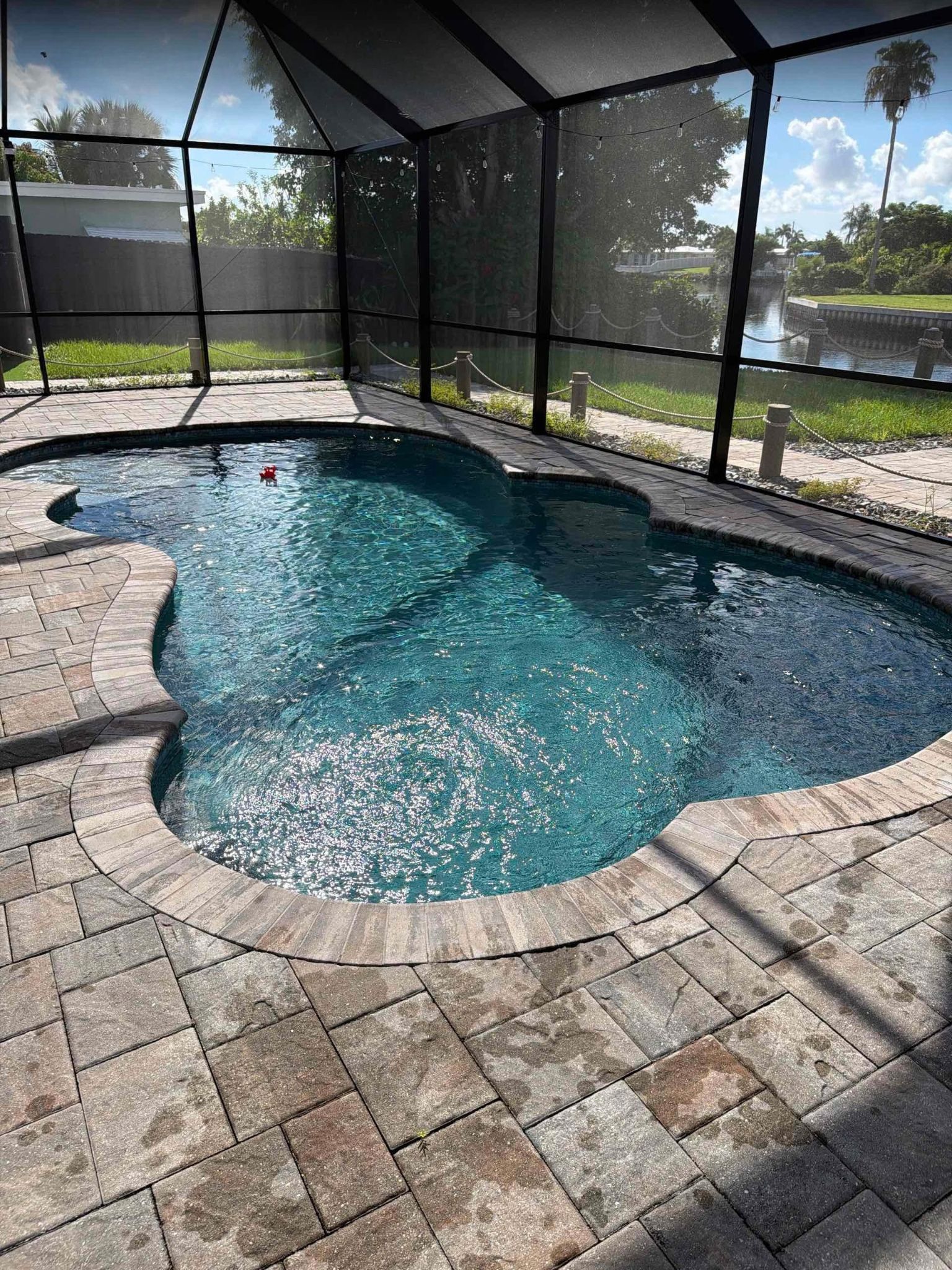 Pool cleaning service in Rotonda Heights backyard pool