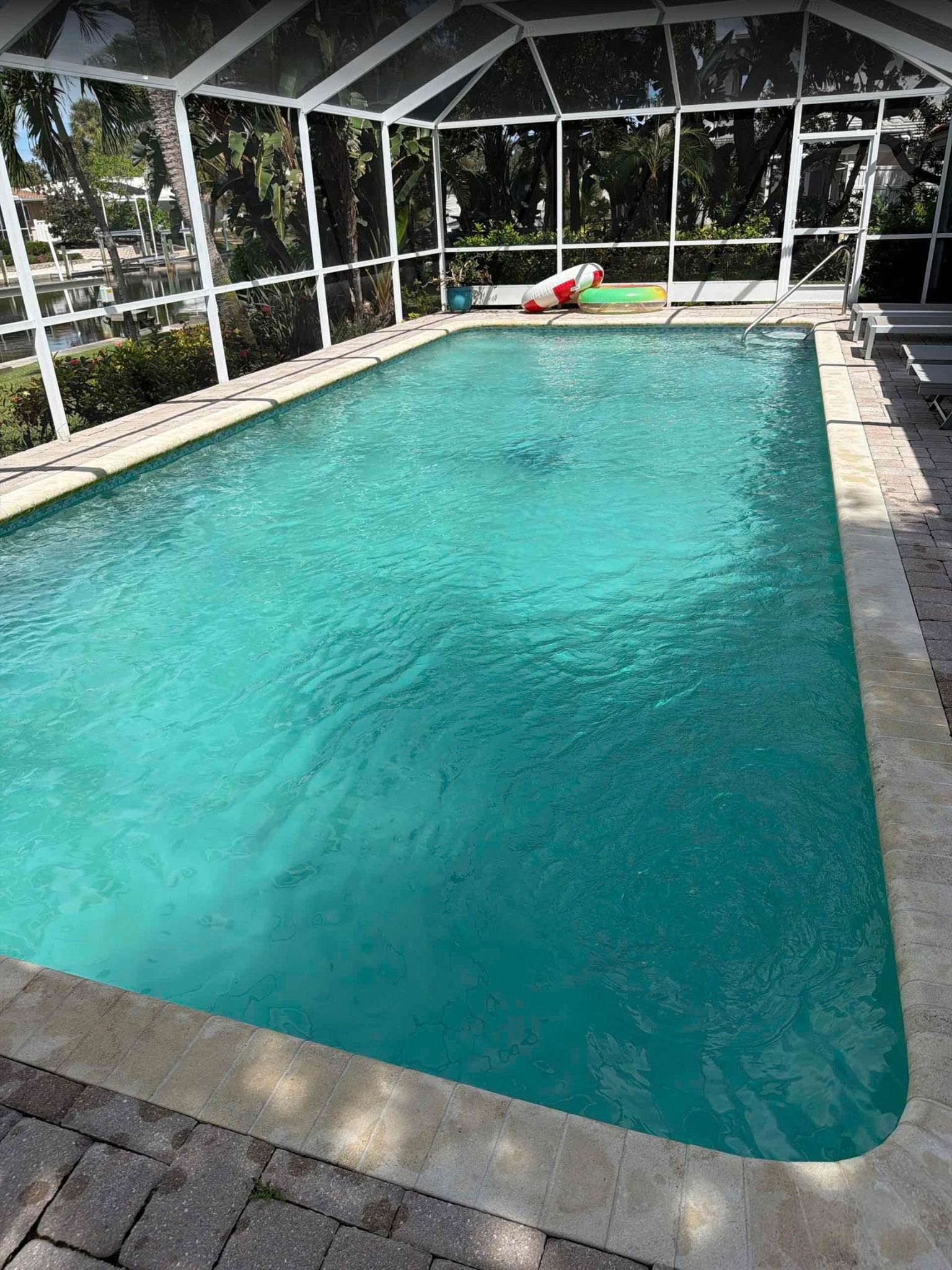 After green pool recovery showing clear turquoise blue water with balanced pool chemistry
