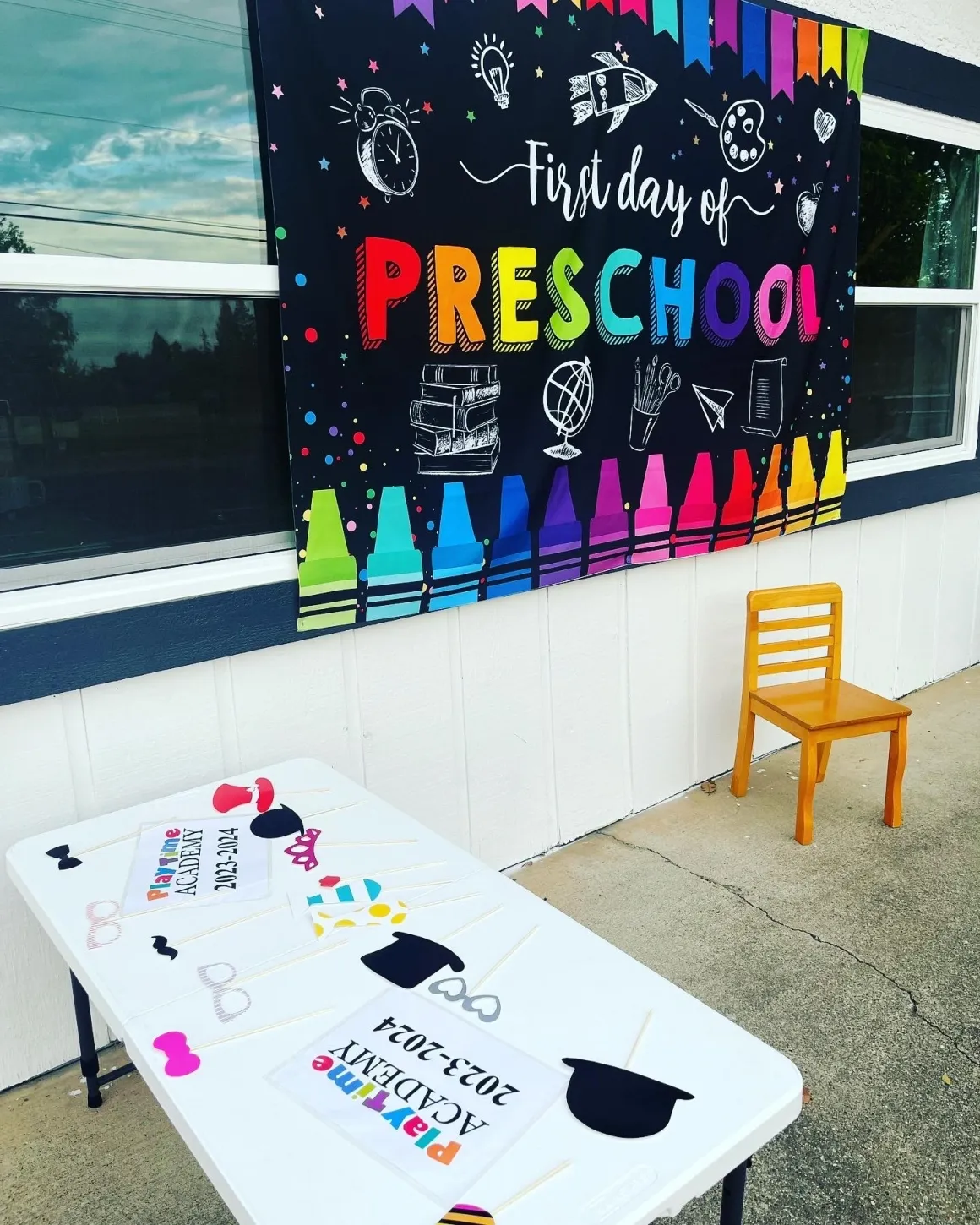First Day of Preschool photo booth celebration with colorful photo props