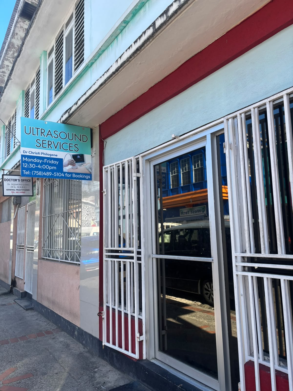 Precision Imaging clinic storefront and Ultrasound Services sign in Castries, Saint Lucia