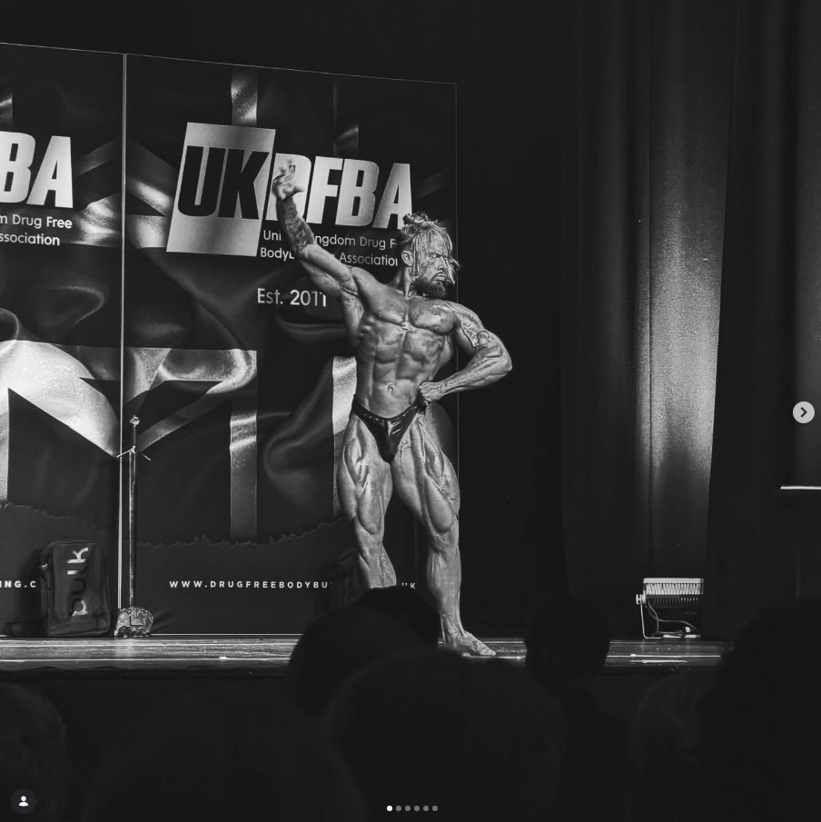 James Alabaster classic aesthetic stage pose at UKDFBA
