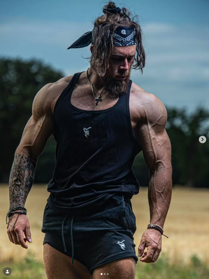 James Alabaster outdoor physique photoshoot in Silverback vest