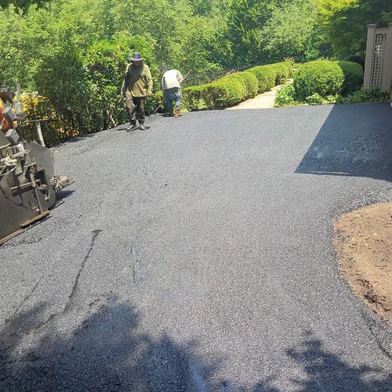Raul Huizar and Lucketts Asphalt Paving Crew in Action
