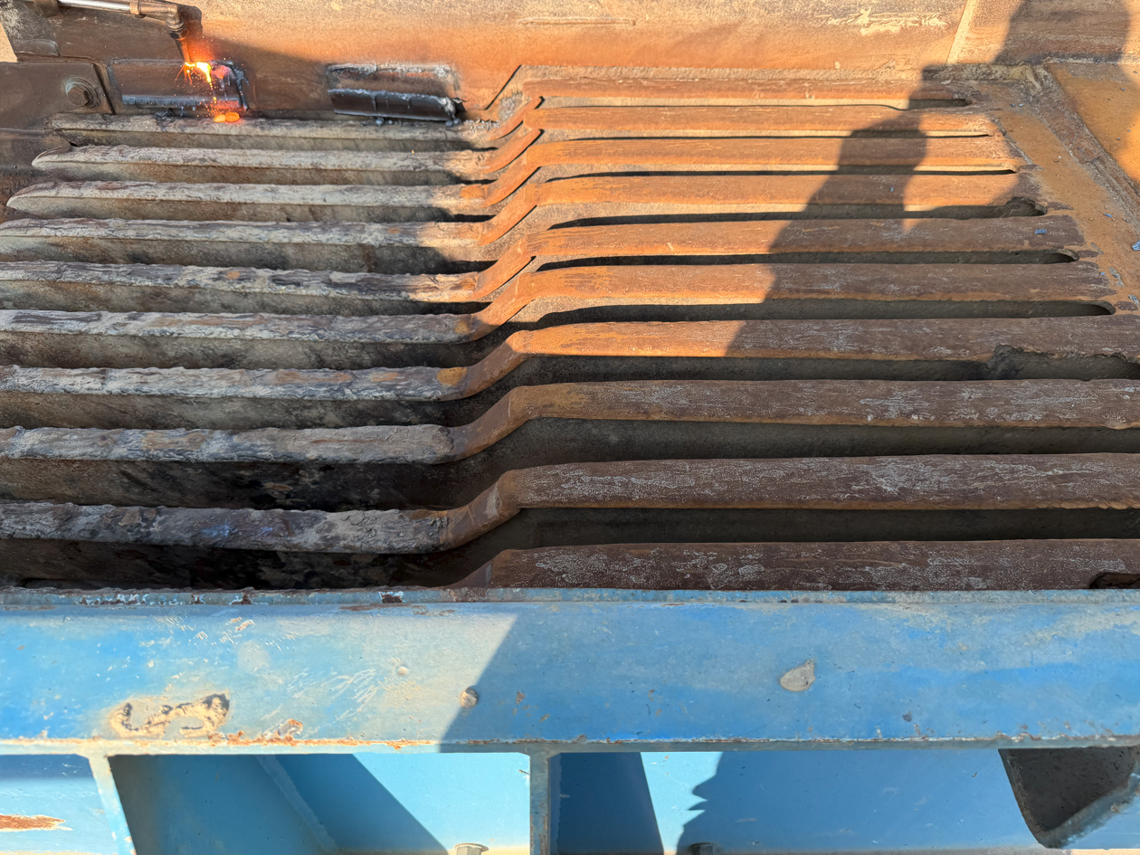 New steel liner plates welded into the corners of a heavy equipment body