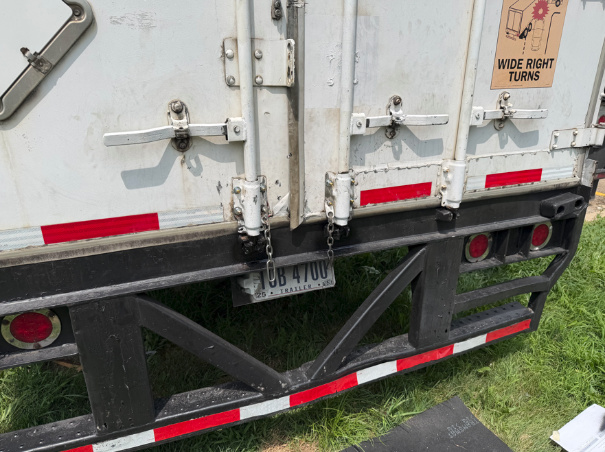 Rear frame and door hinges of a dry van trailer after weld repair