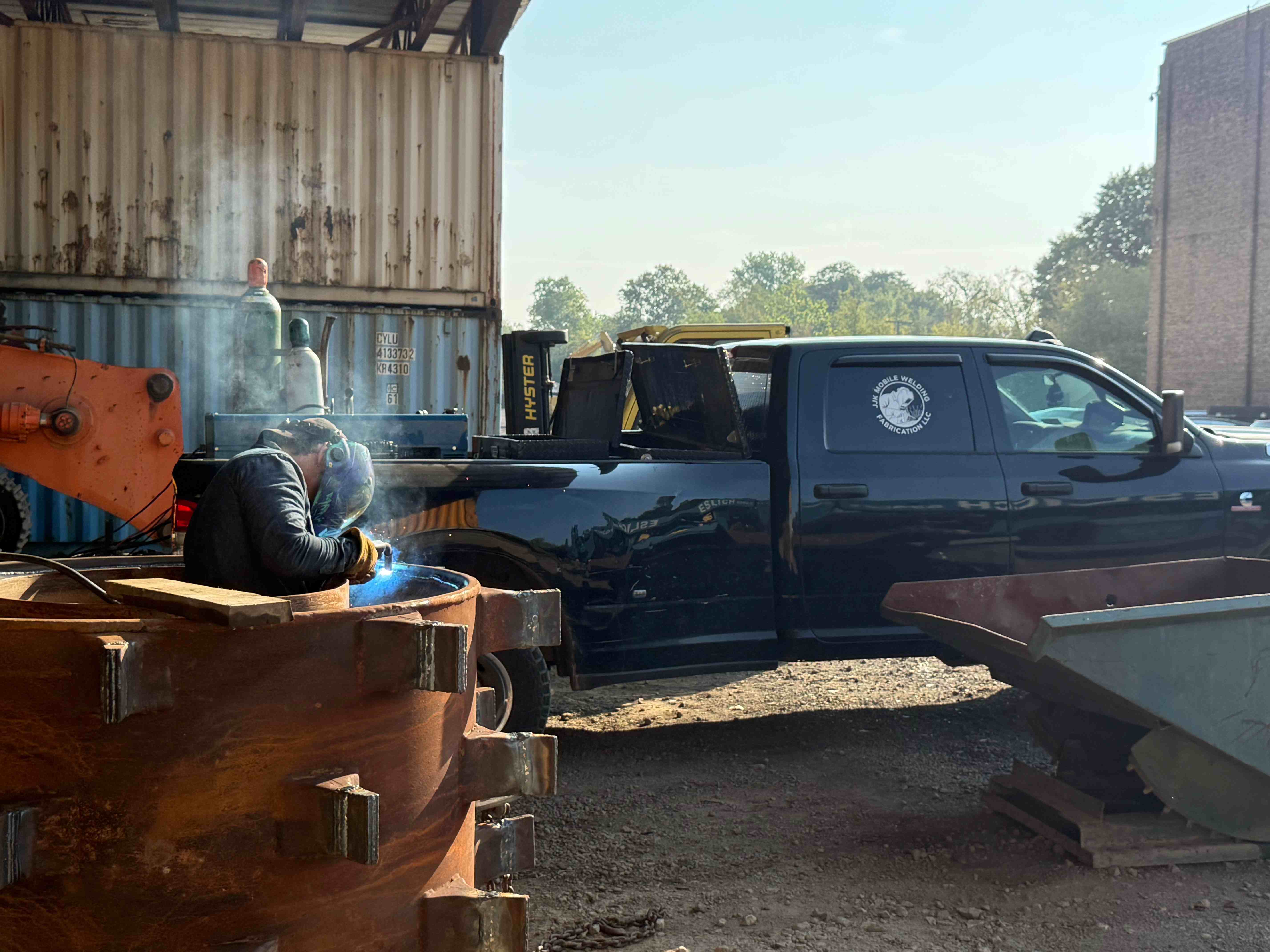 JJK Mobile Welding truck on site with welding underway on a heavy steel bucket