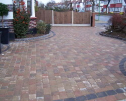 Full patterned concrete driveway forecourt with decorative brick kerb
