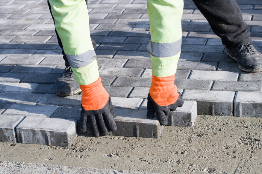 Traditional and contemporary paving blocks laid by hand with precision